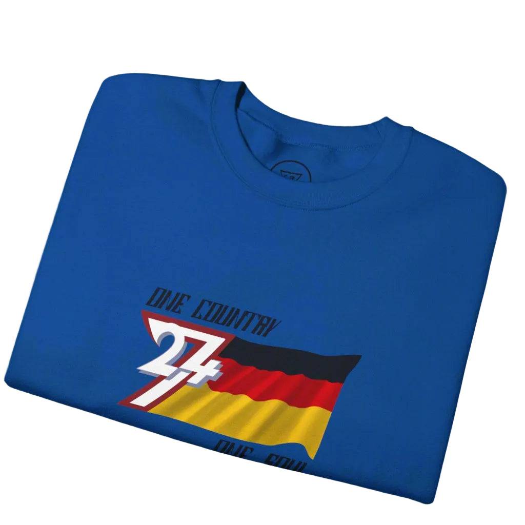 Folded blue sweatshirt with a graphic design of the Germany flag by 24/7 Unique Designs