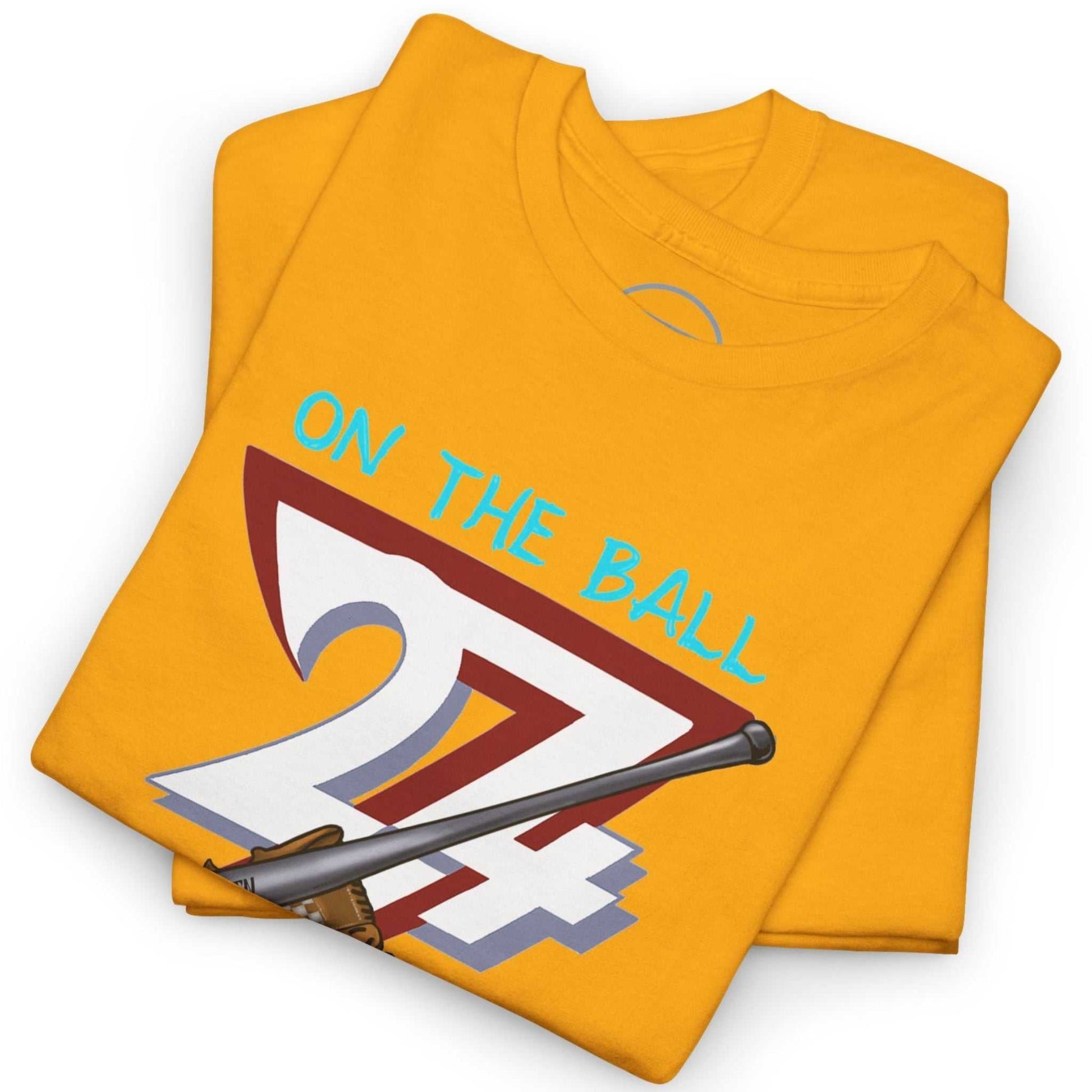 Neatly folded gold baseball fan gift shirt highlighting the crisp digital front print and durable fabric, laid flat.