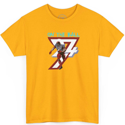 Front view of a vibrant gold comic-style American football graphic tee featuring the digitally hand-drawn On the Ball art, displayed on a clean background.