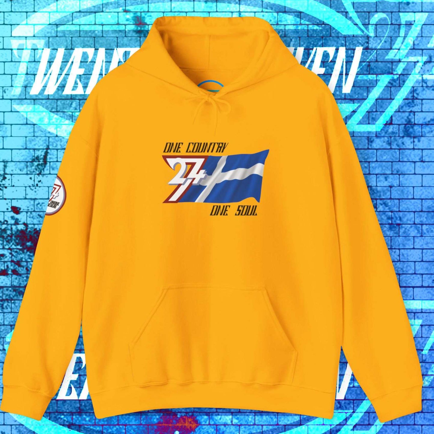 Luxury-style Gold Suomi hoodie featuring the hand-drawn national symbol and "One Country One Soul" text.