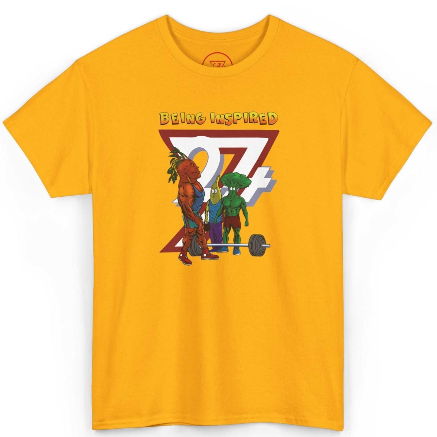 Front view of a bold gold funny workout shirt featuring the dynamic Being Inspired cartoon graphic, shown on a clean background.