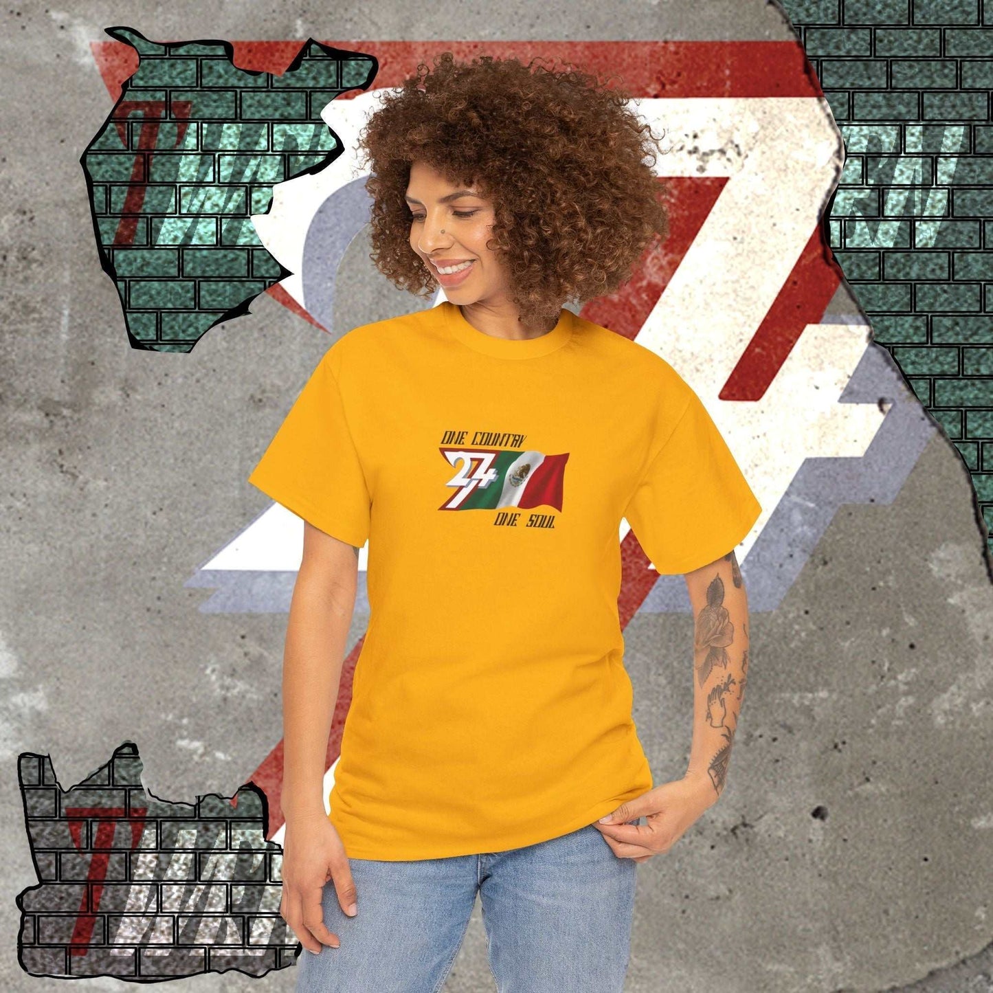 Female model wearing the Mexico "Patria" edition tee in Army Green, showing a bold, refined streetwear look.