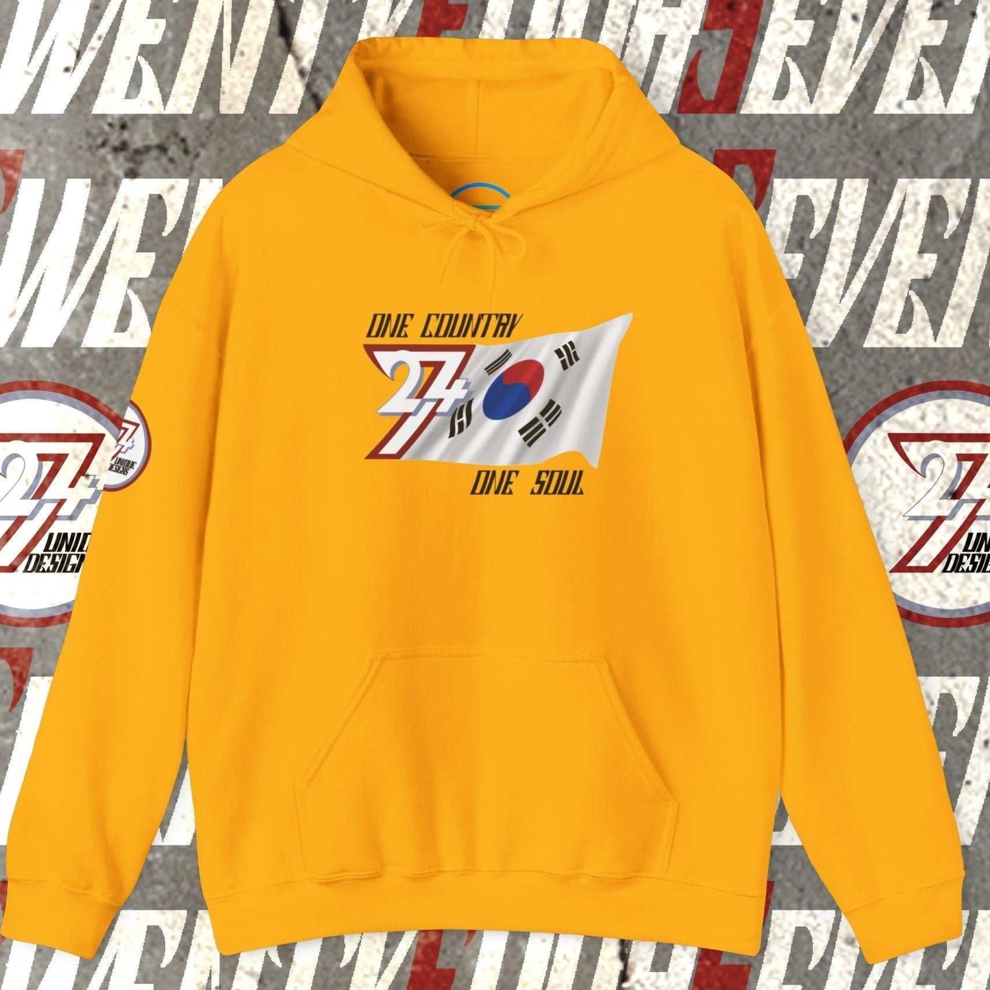 Front view of the Gold Daehan Minguk flag hoodie featuring the refined artist-drawn design and motto.