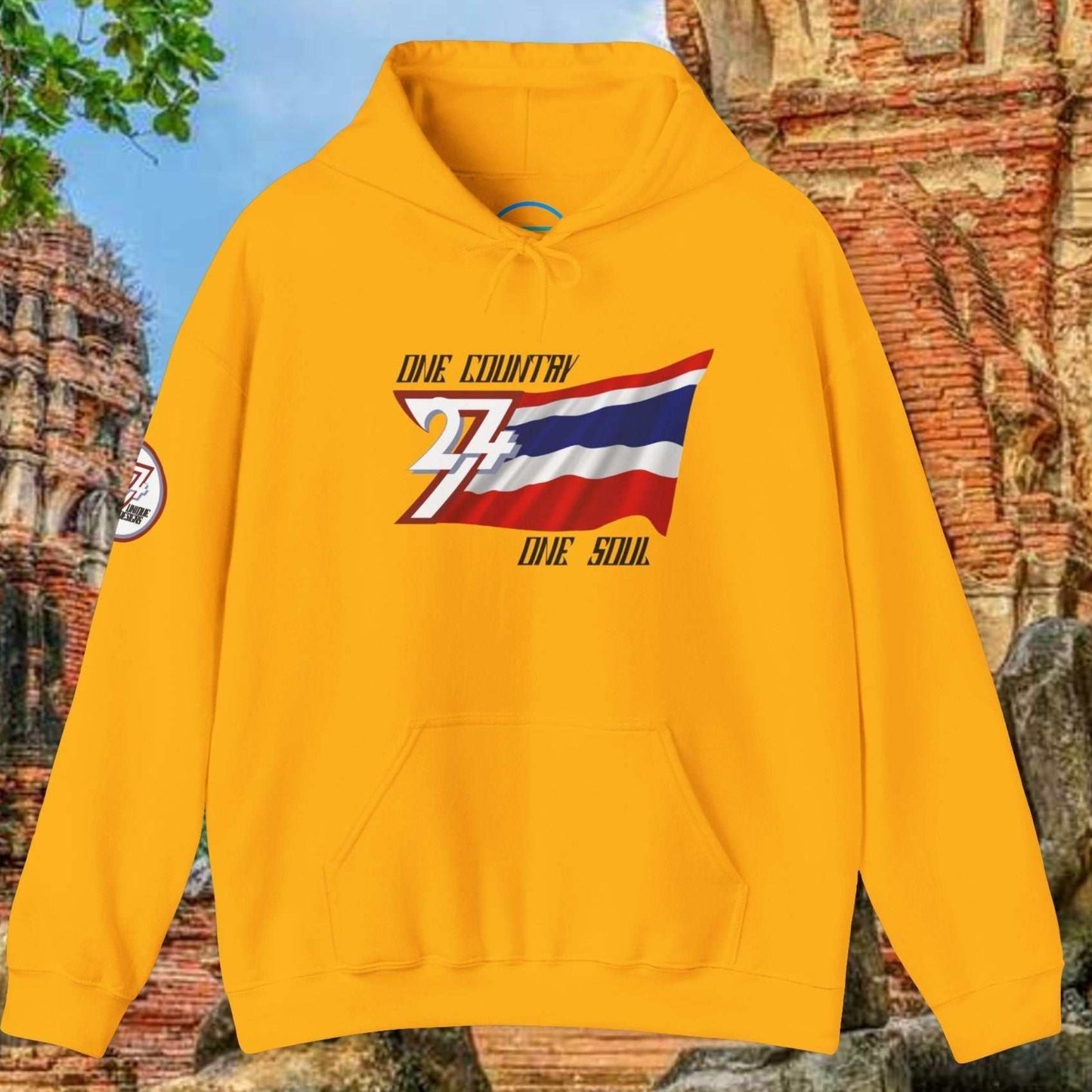 Front view of the Gold Thailand flag hoodie featuring the refined artist-drawn design and motto.