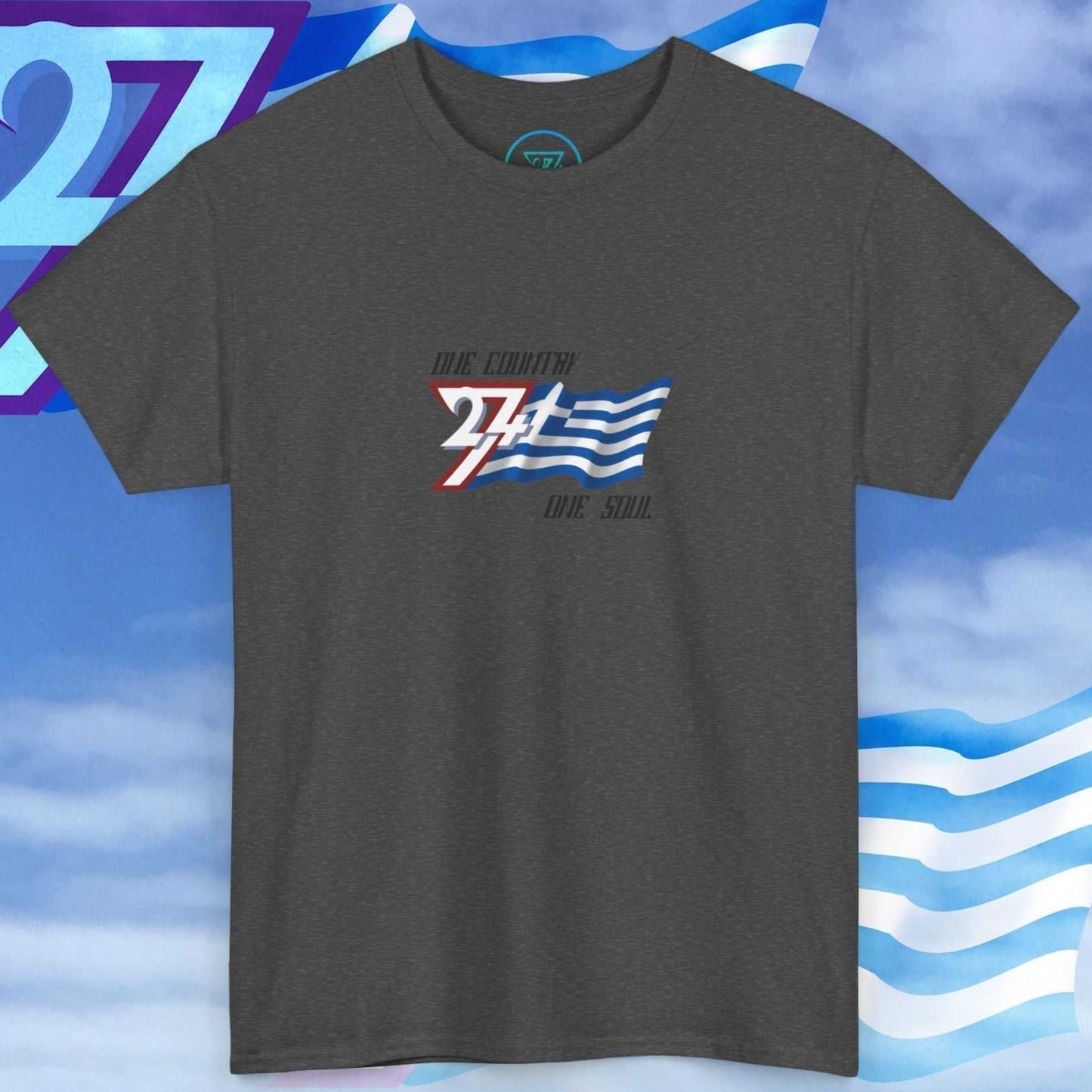 Digitally illustrated Greece graphic tee in charcoal showing the hand-sketched national flag and "One Country One Soul" signature.