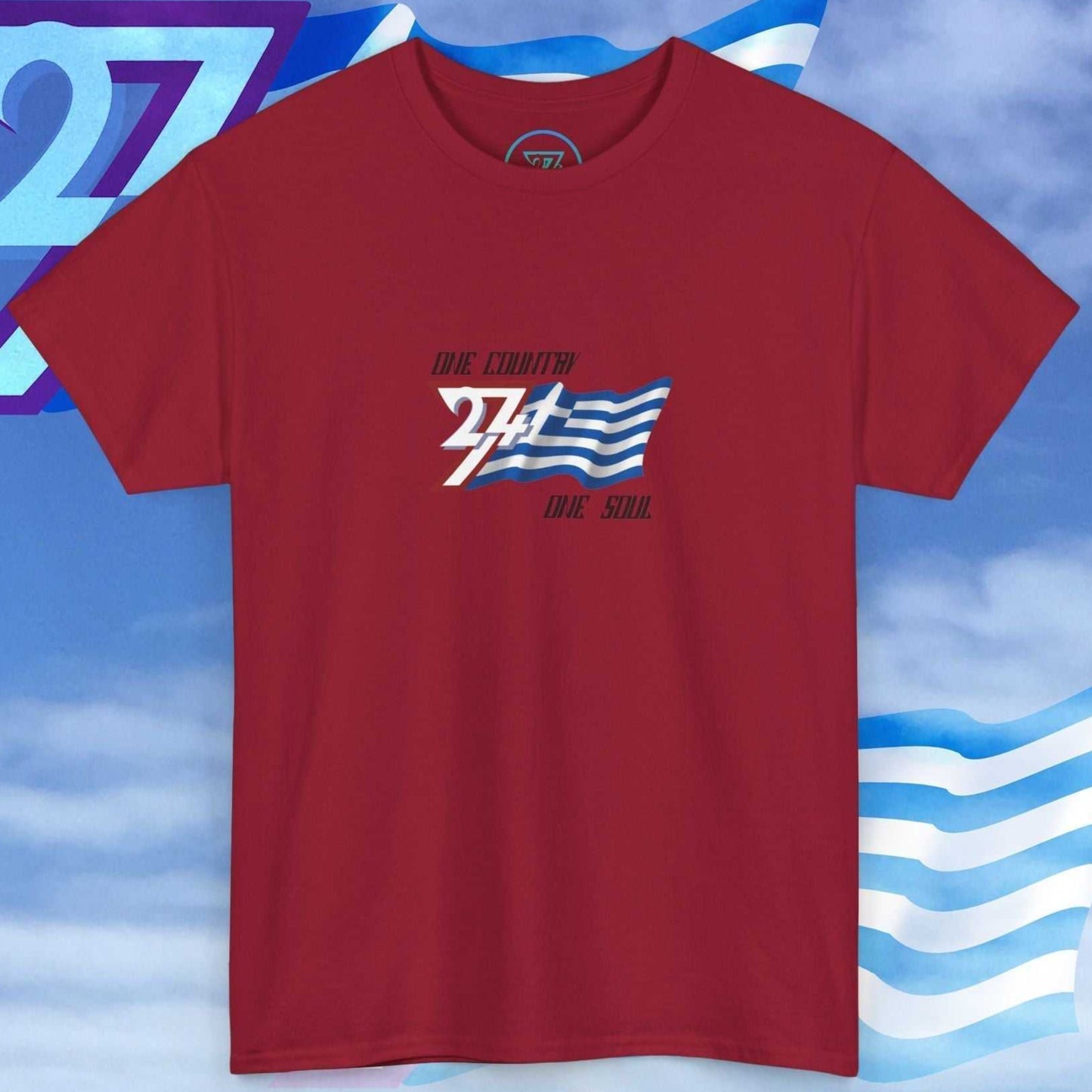 Artistic front shot of a deep red Greece flag tee highlighting the hand-drawn stripes and "One Country One Soul" slogan.