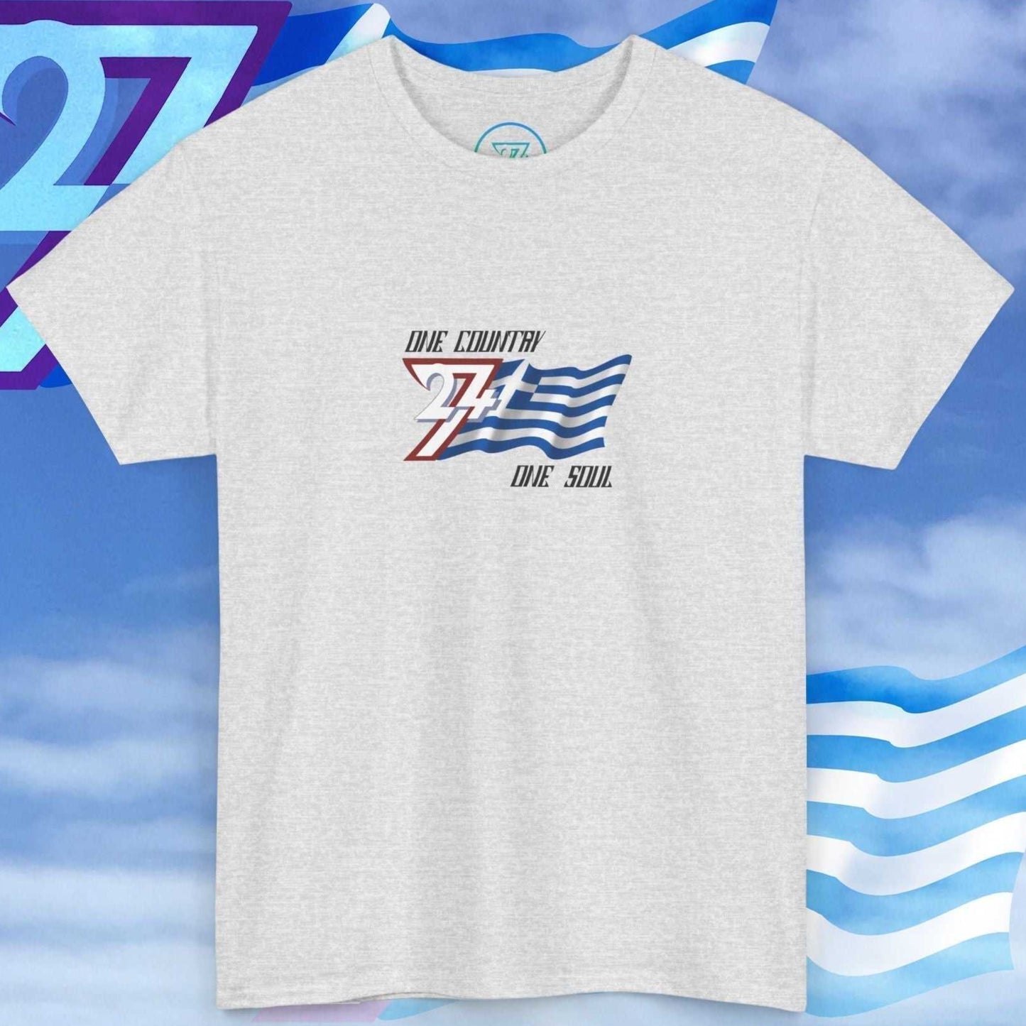Digitally illustrated Greece graphic tee in light gray showing the hand-sketched national flag and "One Country One Soul" signature.