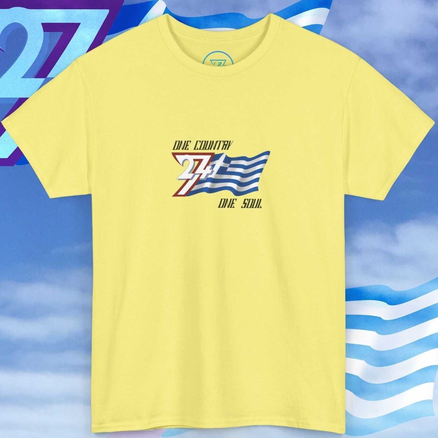 Full front view of a light yellow Greece flag t-shirt featuring a hand-drawn blue and white design and "One Country One Soul" slogan.