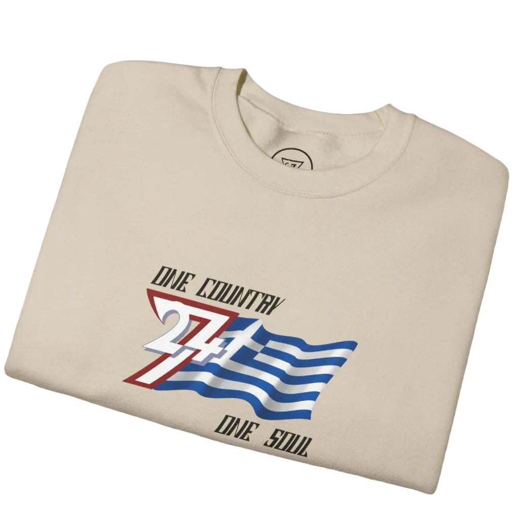Folded beige t-shirt with graphic design of the Greece national flag