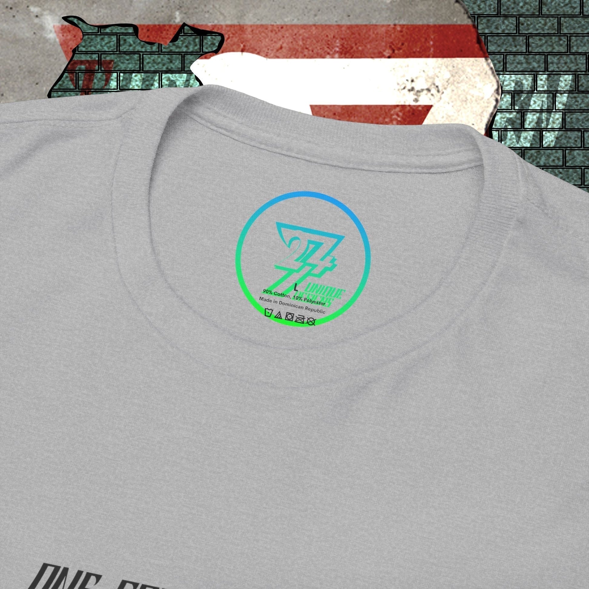 Close-up of the inner neck label showing the authentic 24/7 Unique Designs™ trademark logo on the Belgium flag tee.