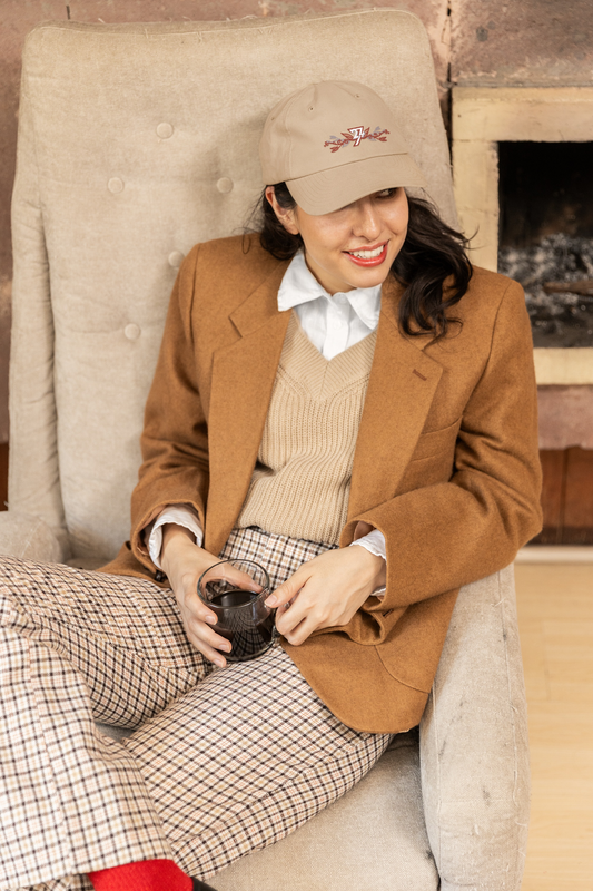Woman wearing the Khaki Horizontal Floral Baseball cap