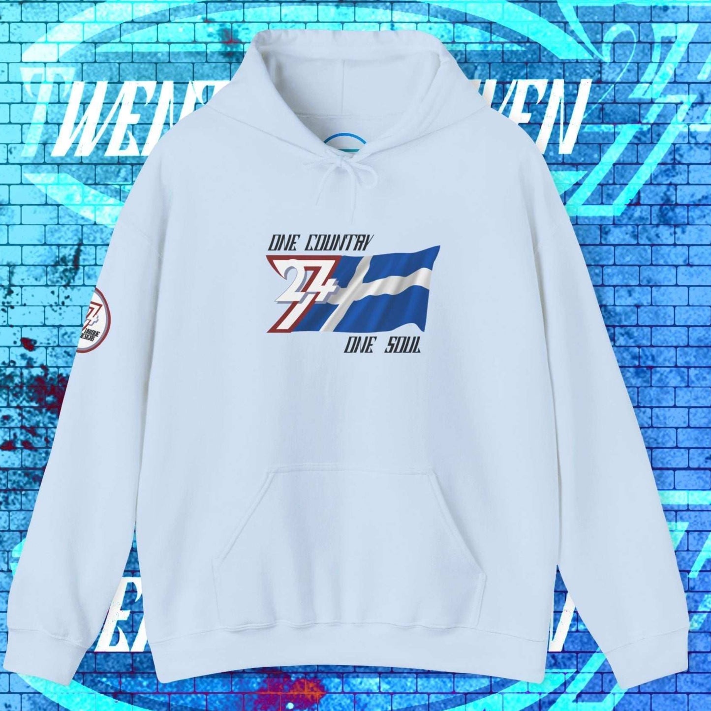 Front perspective of the Light Blue Finland hoodie, featuring a fleece-lined interior and 24/7 signature sleeve branding.