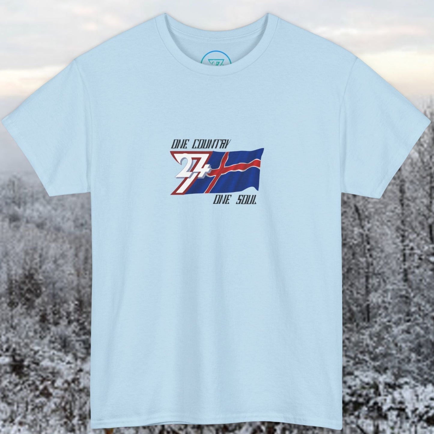 Front perspective of the premium Light Blue Iceland flag shirt with a refined hand-drawn finish and "One Country One Soul" text.
