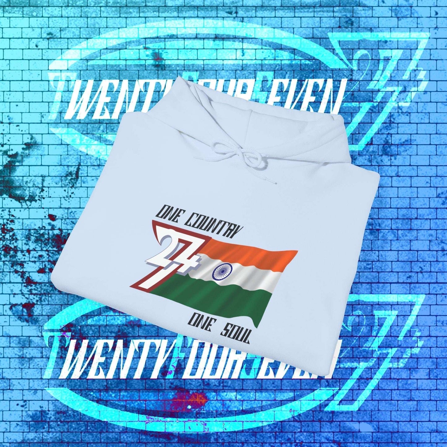 A professional display of the Bharat flag hoodie in Light Blue, folded to showcase the refined hand-drawn graphic and 8oz fabric weight.