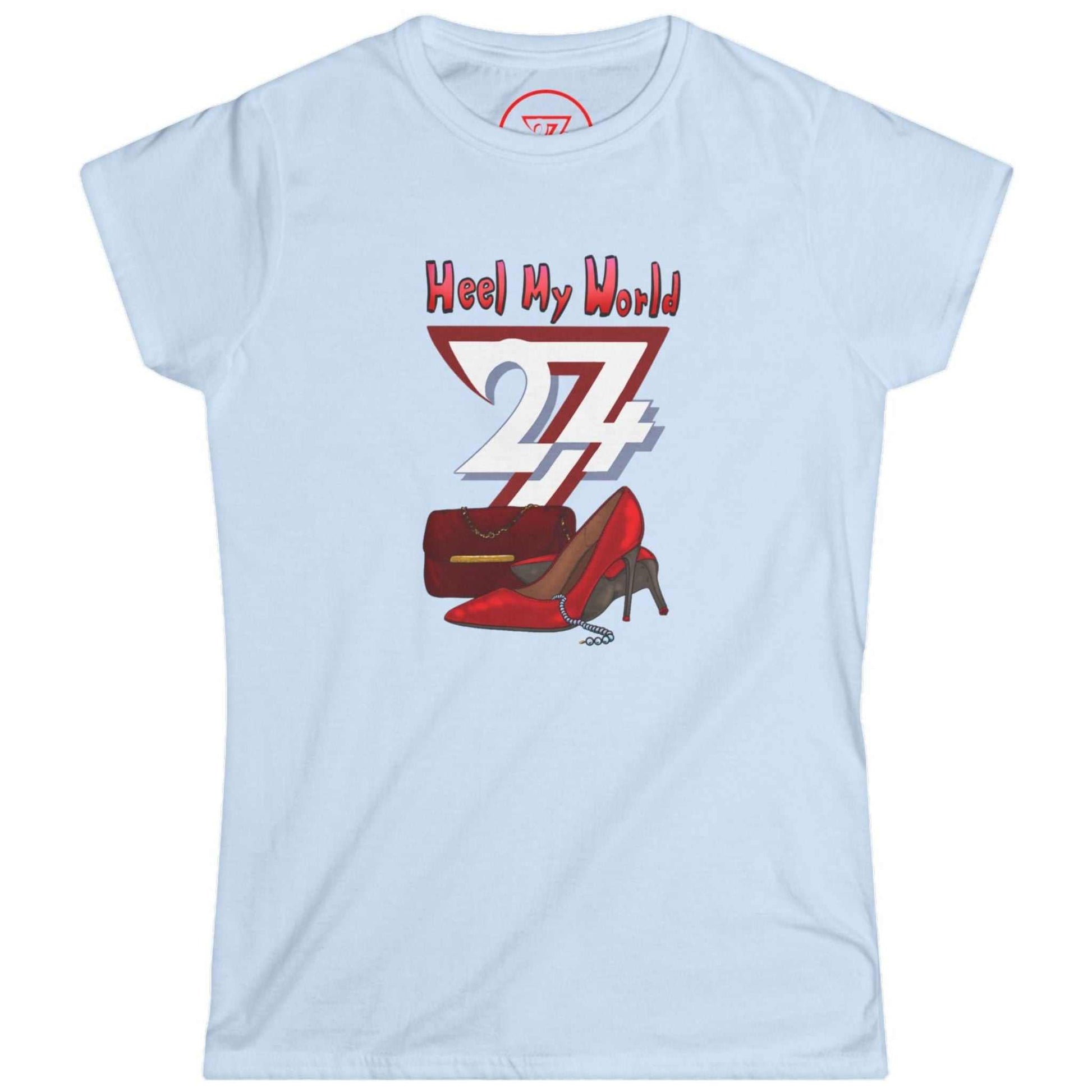 Light blue retail therapy shirt displaying the 'Heel My World' fashion illustration, laid flat.