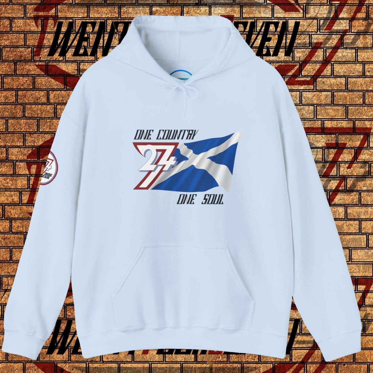 Full product shot of the Light Blue Scotland flag hoodie showcasing the hand-drawn artwork.