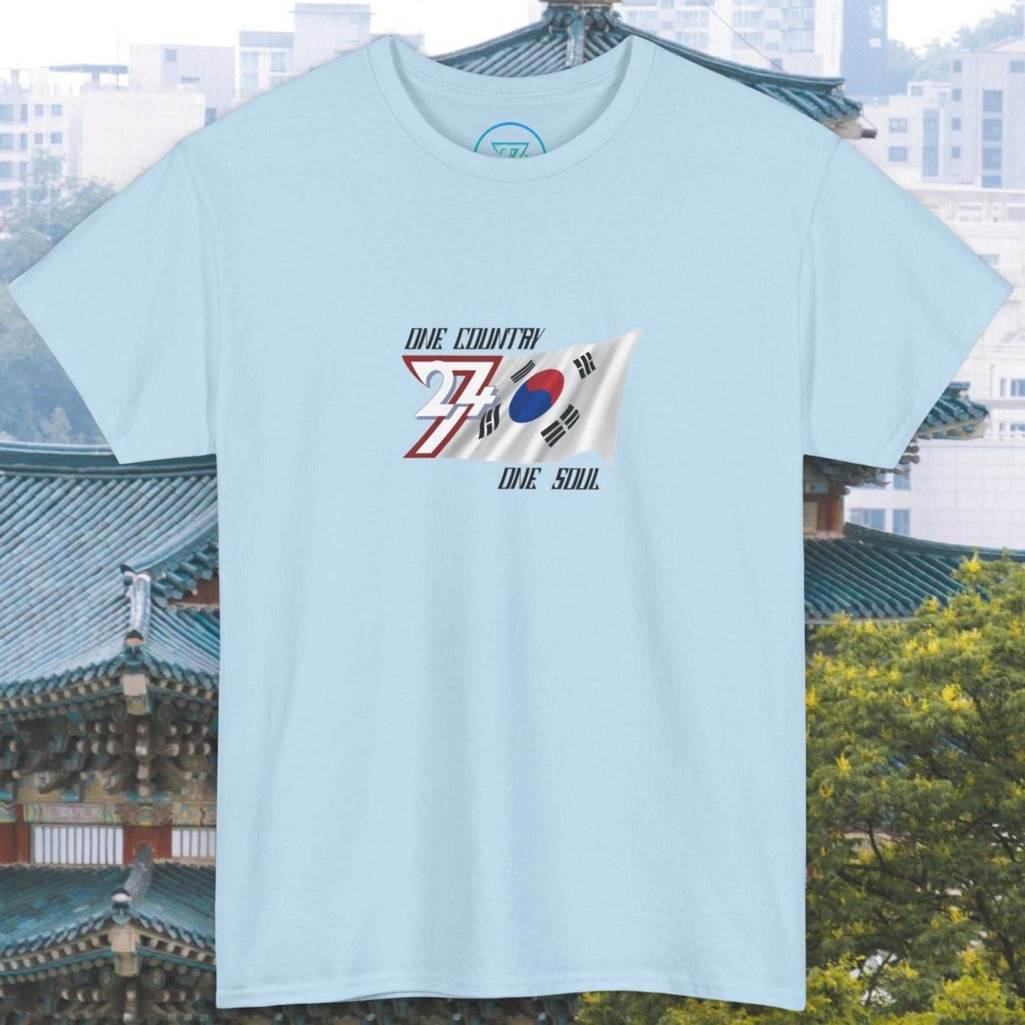 Light blue unisex T-shirt with hand-drawn South Korea flag graphic and "One Country One Soul" text design.