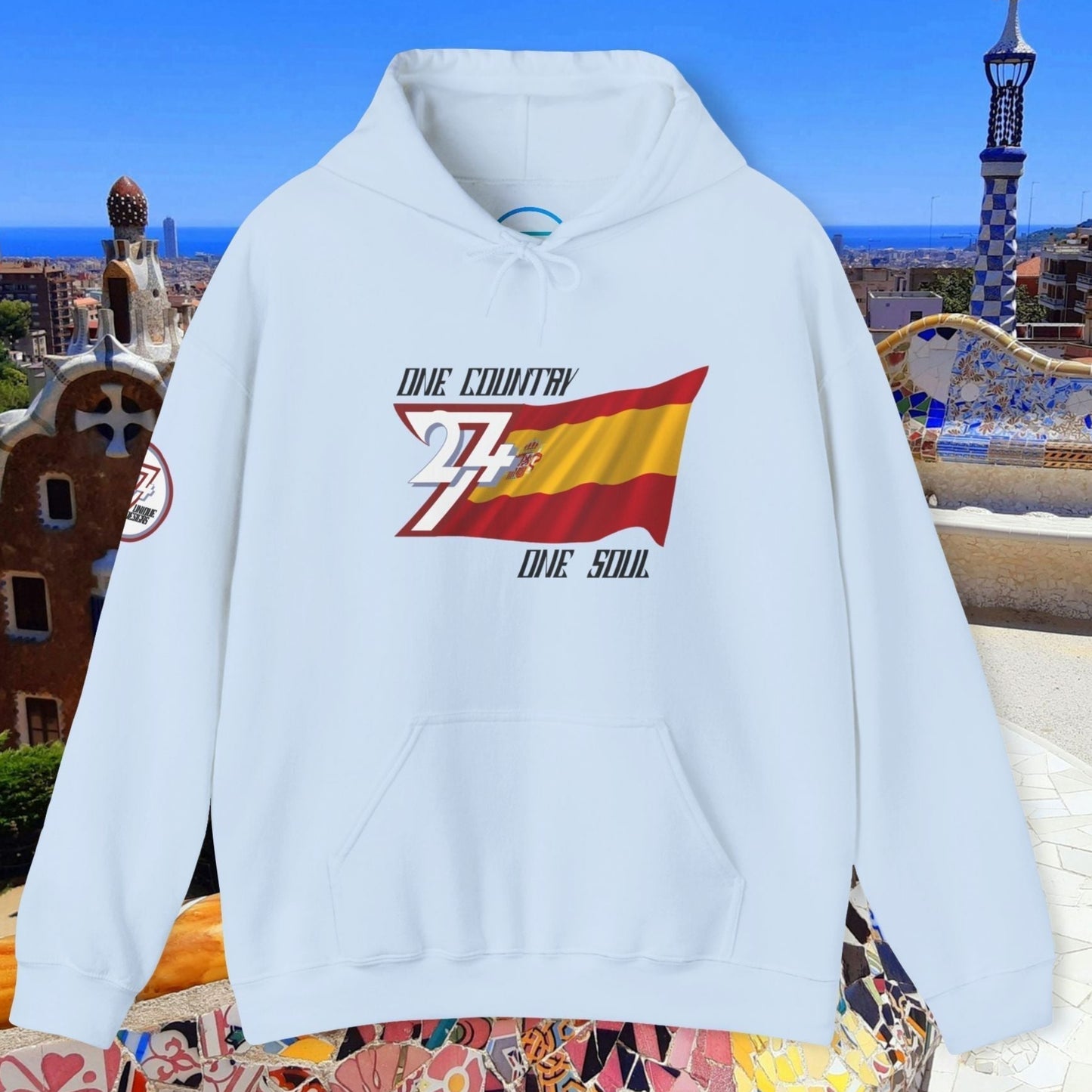 Full product shot of the Light Blue Spain flag hoodie showcasing the hand-drawn artwork.