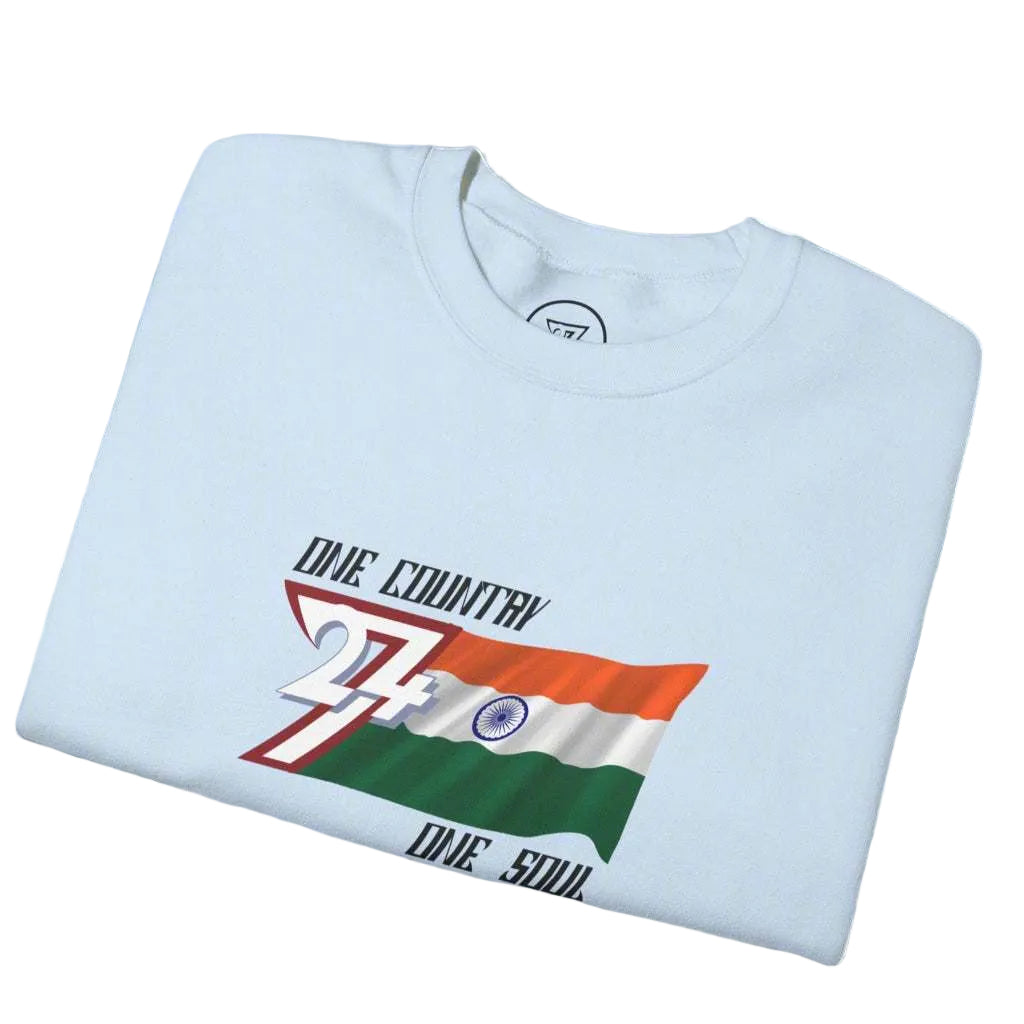 Folded light blue sweatshirt with India flag design and "One country one soul" slogan on chest.