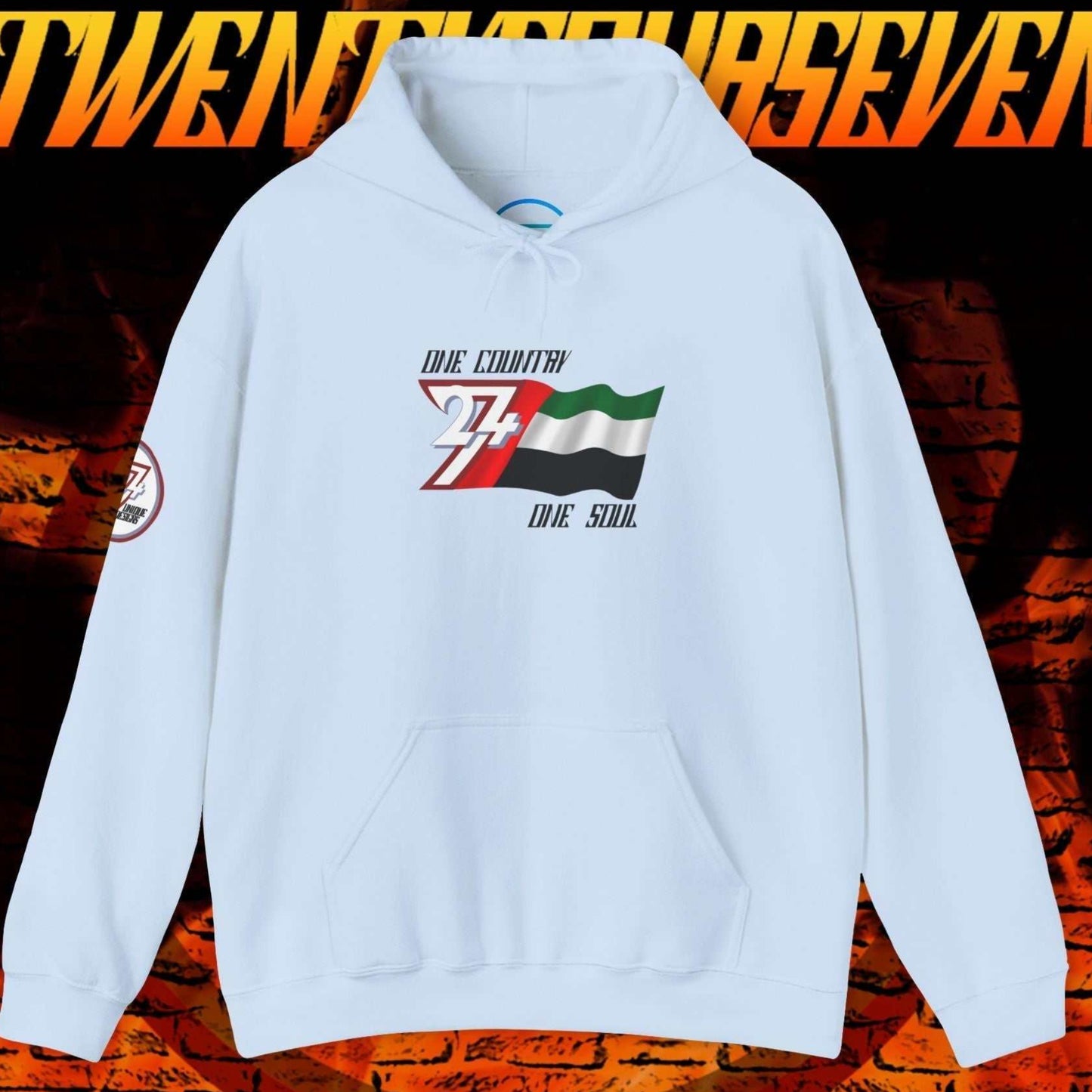 Full product shot of the Light Blue UAE flag hoodie showcasing the hand-drawn artwork.