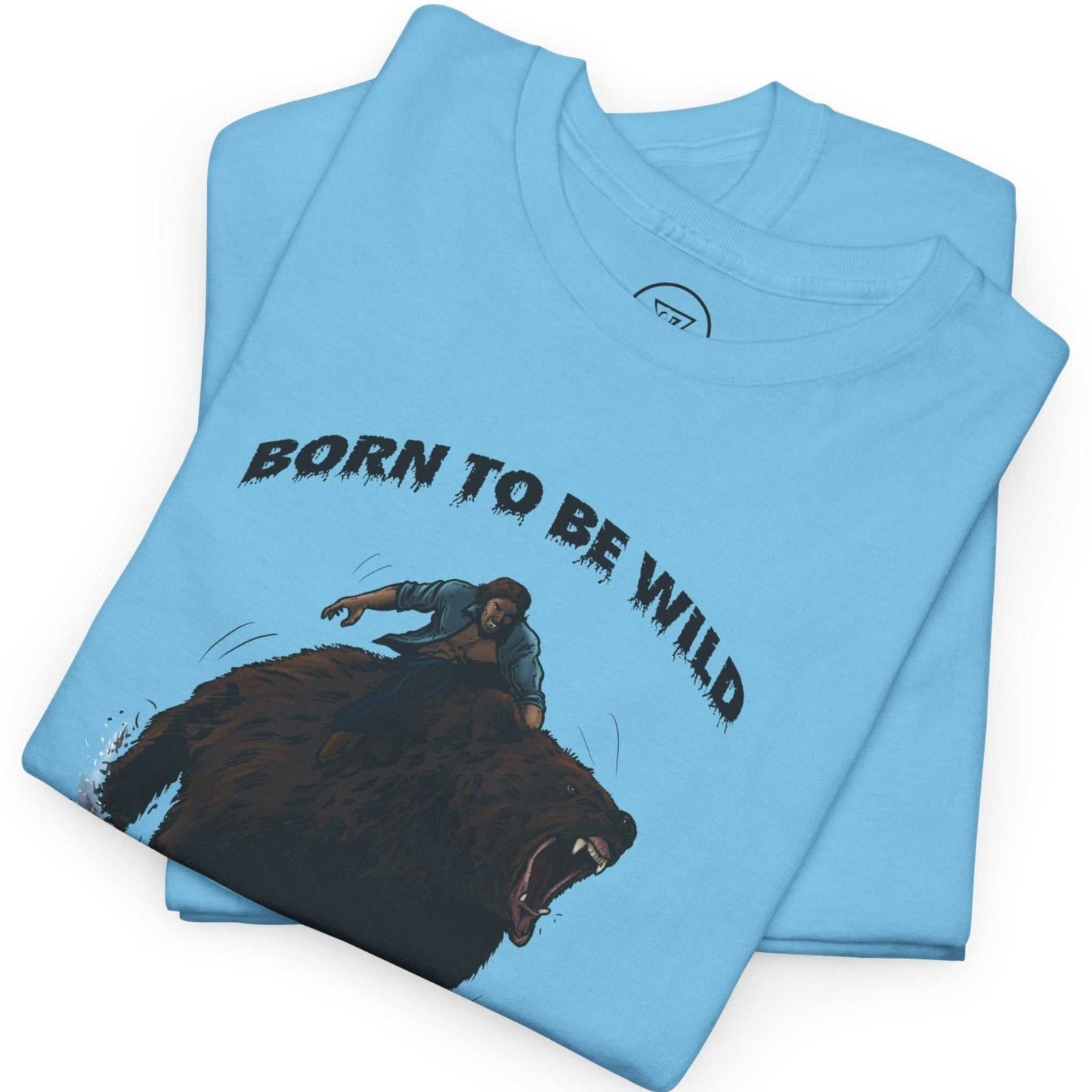 Neatly folded sky blue vintage 90s retro animal shirt showing the heavy cotton fabric and crisp black typography.