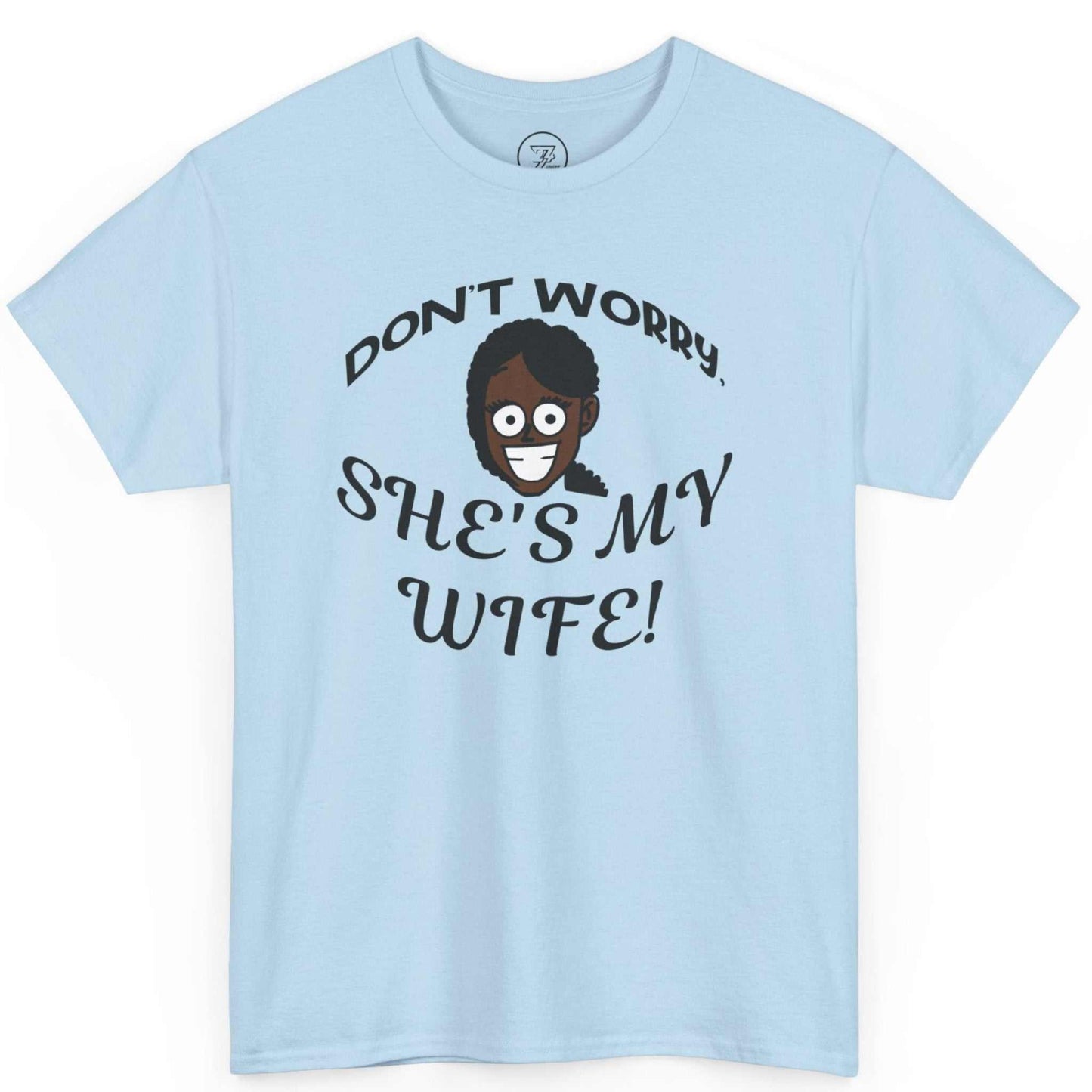 Solid light blue viral meme festival tee displaying the don't worry she's my wife typography.