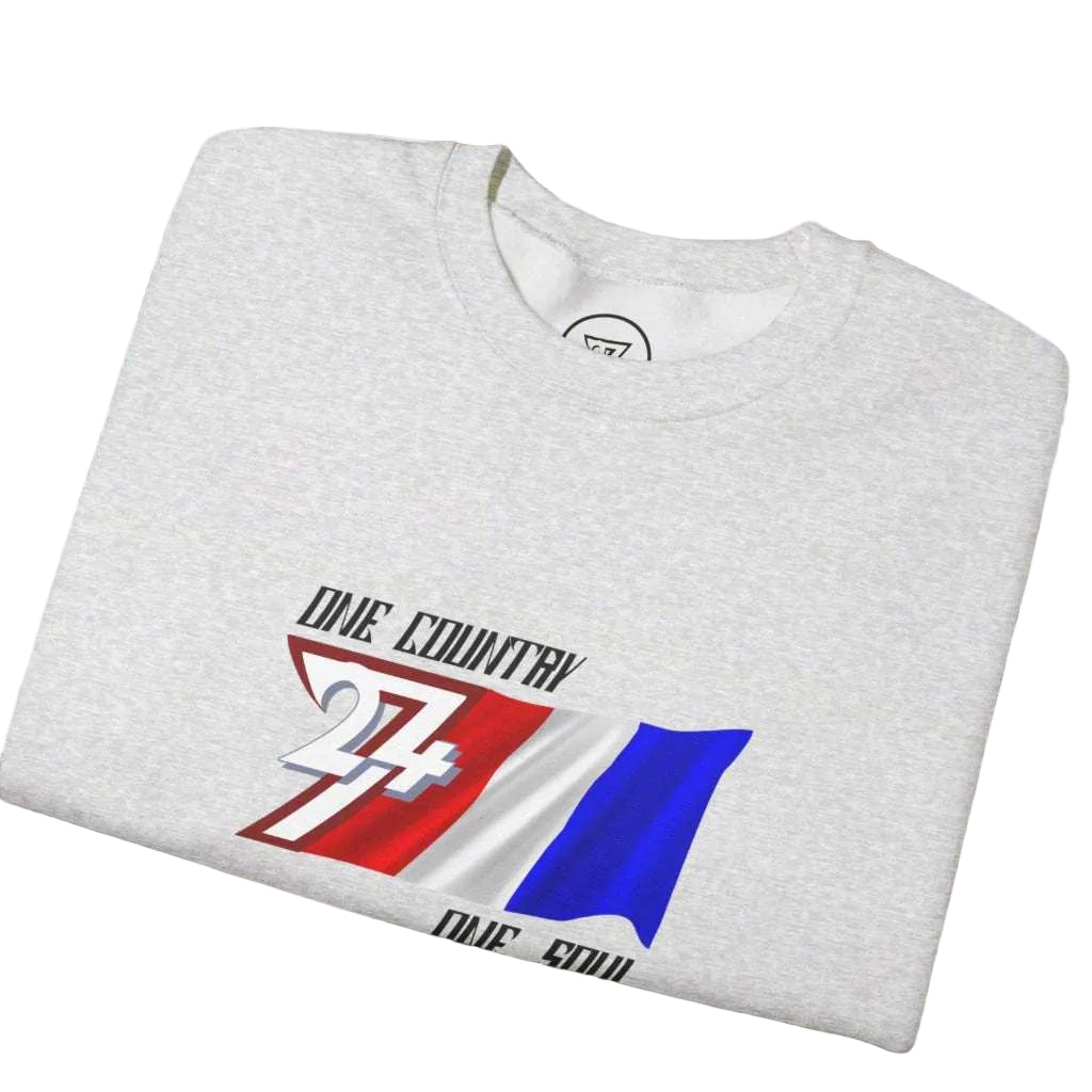 Folded grey unisex sweatshirt with hand-drawn France flag and "One Country One Soul" slogan graphic.