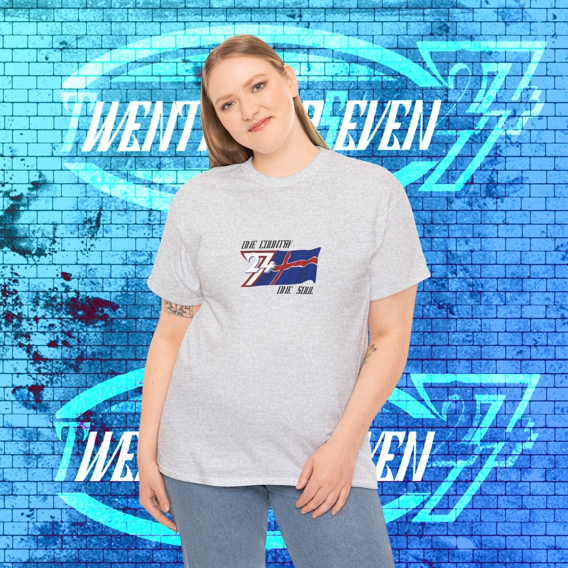 female model wearing the Iceland "Frost" edition tee in Light Heather Gray, showing a modern, clean streetwear look.