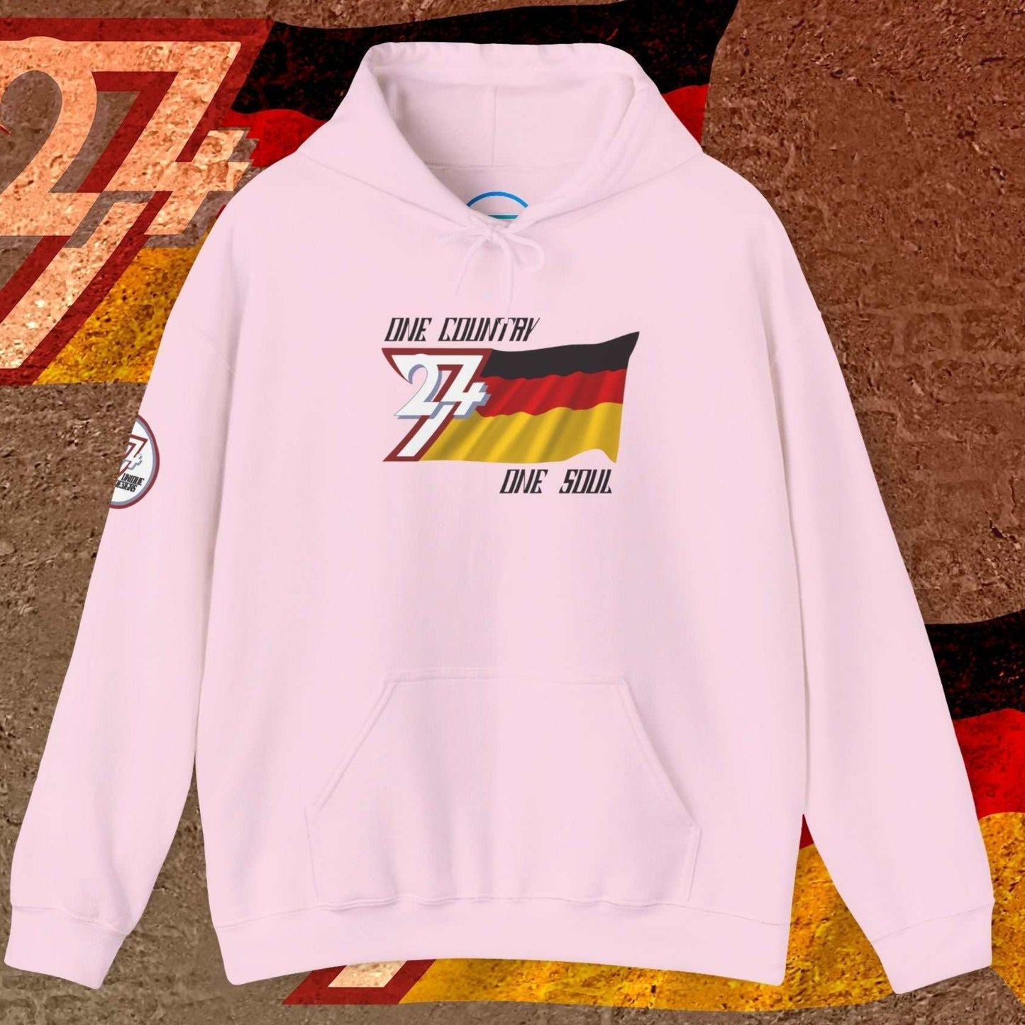 A soft Light Pink heavyweight hoodie featuring a sophisticated, hand-drawn take on the German national symbol.