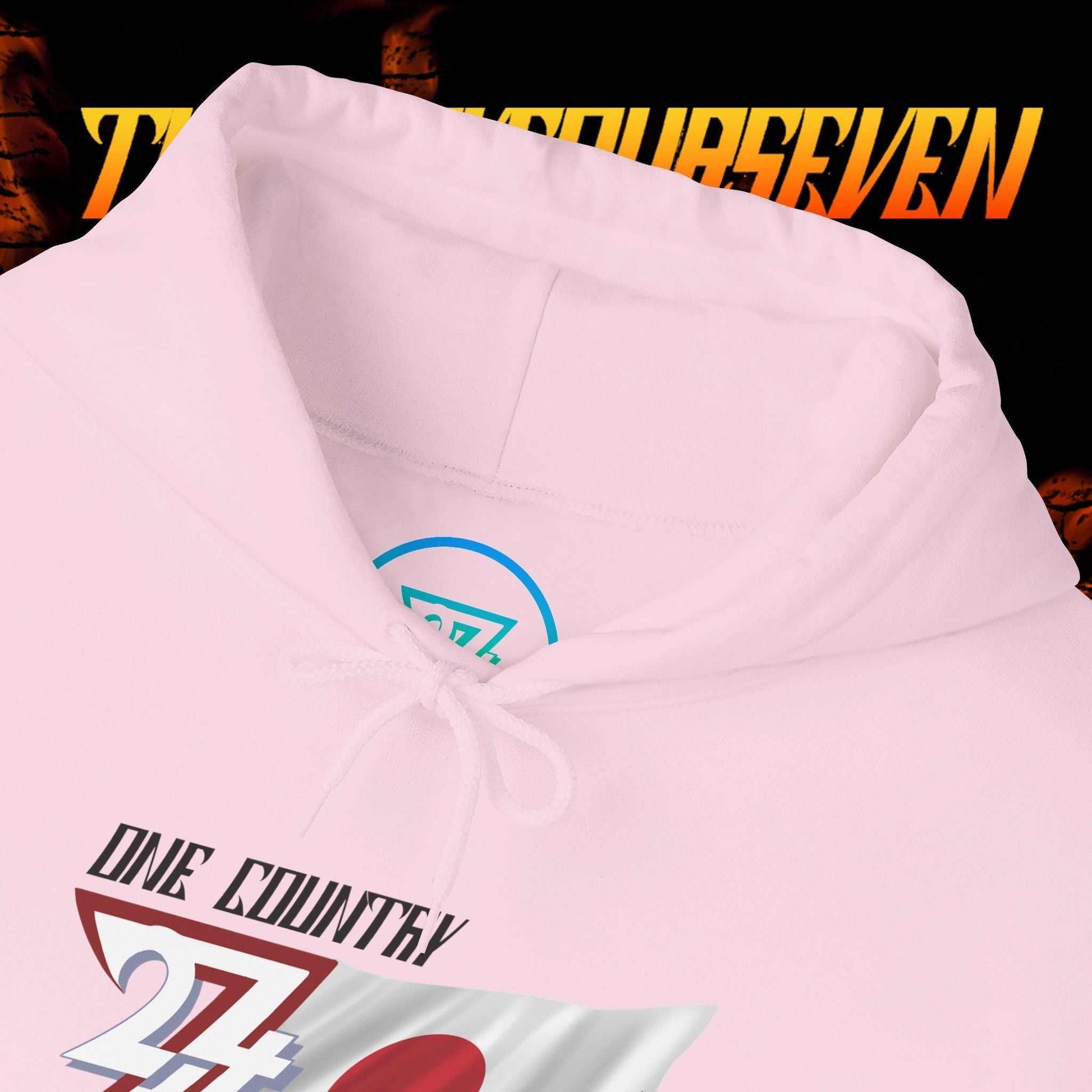 Macro close-up of the inner neck area showing the tear-away label and authentic 24/7 Unique Designs trademark logo.