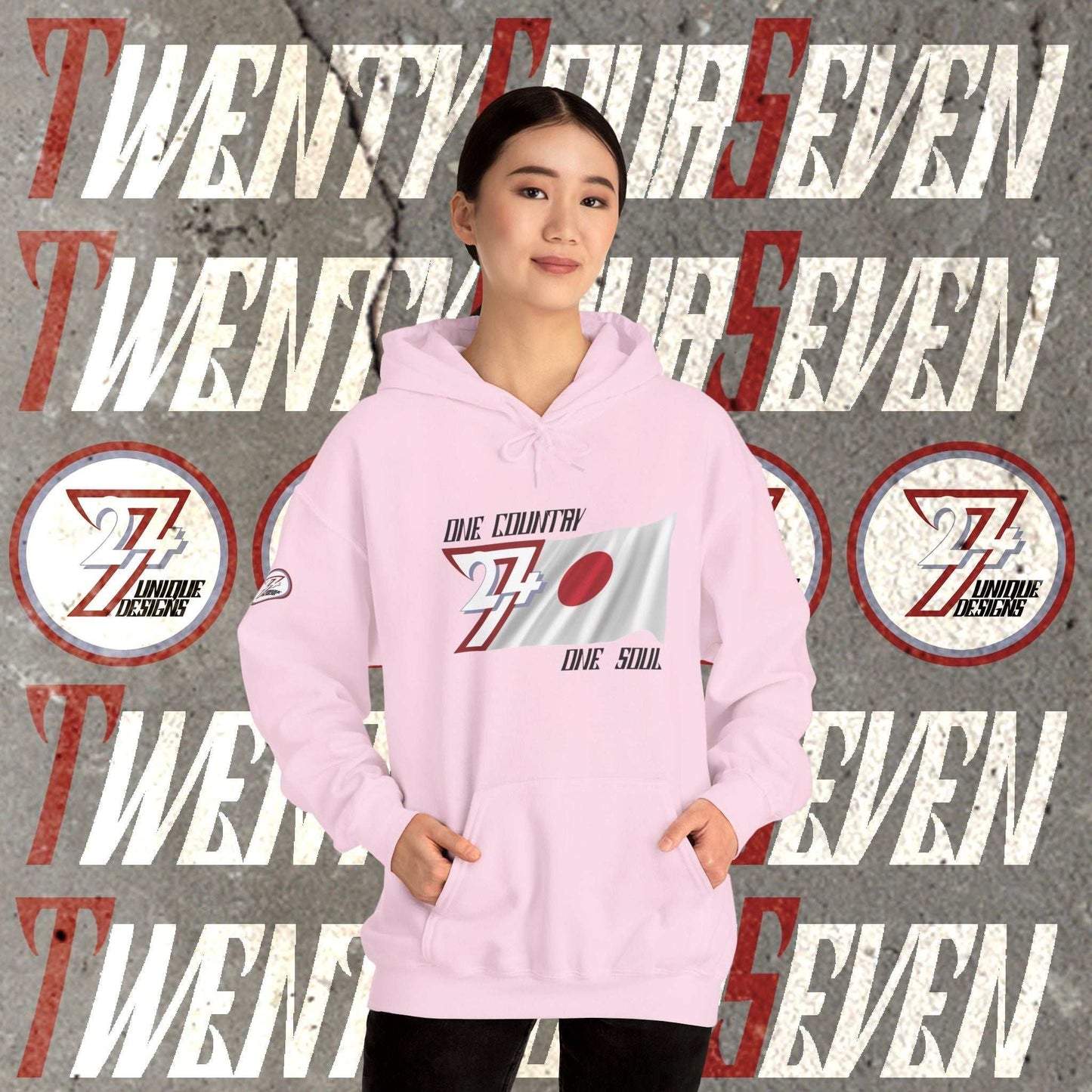 Model wearing the Nihon "Zenith" edition hoodie in Light Pink, showing a modern, refined Japanese streetwear look.