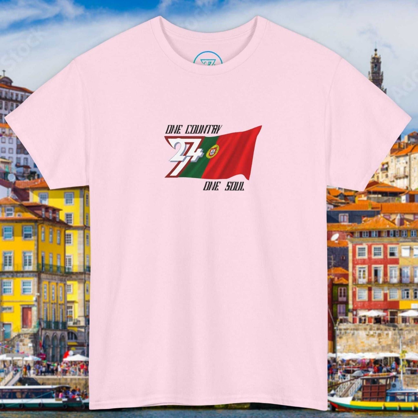 Front view of a light pink graphic t-shirt featuring a digitally hand-drawn Portugal flag design.
