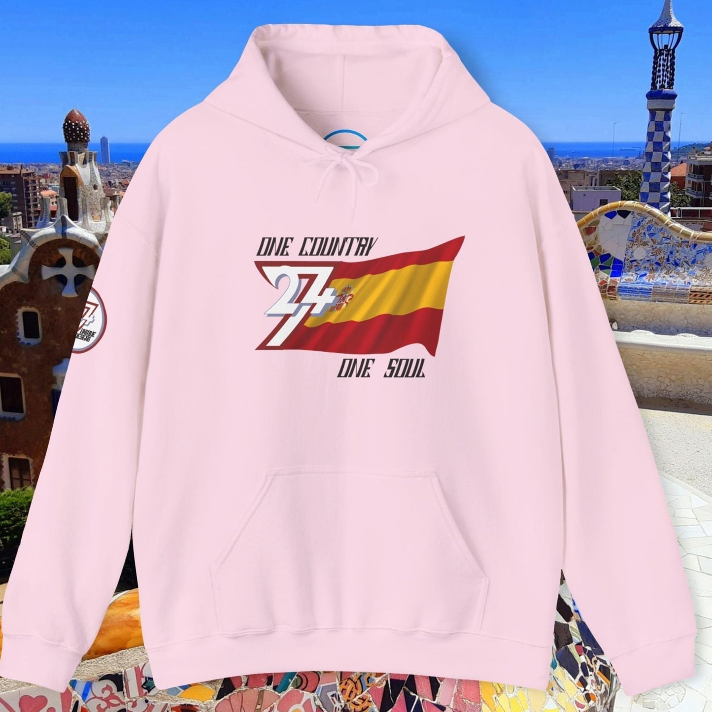 Front view of the Light Pink España "Pasión" edition hoodie highlighting the clean hand-drawn lines.