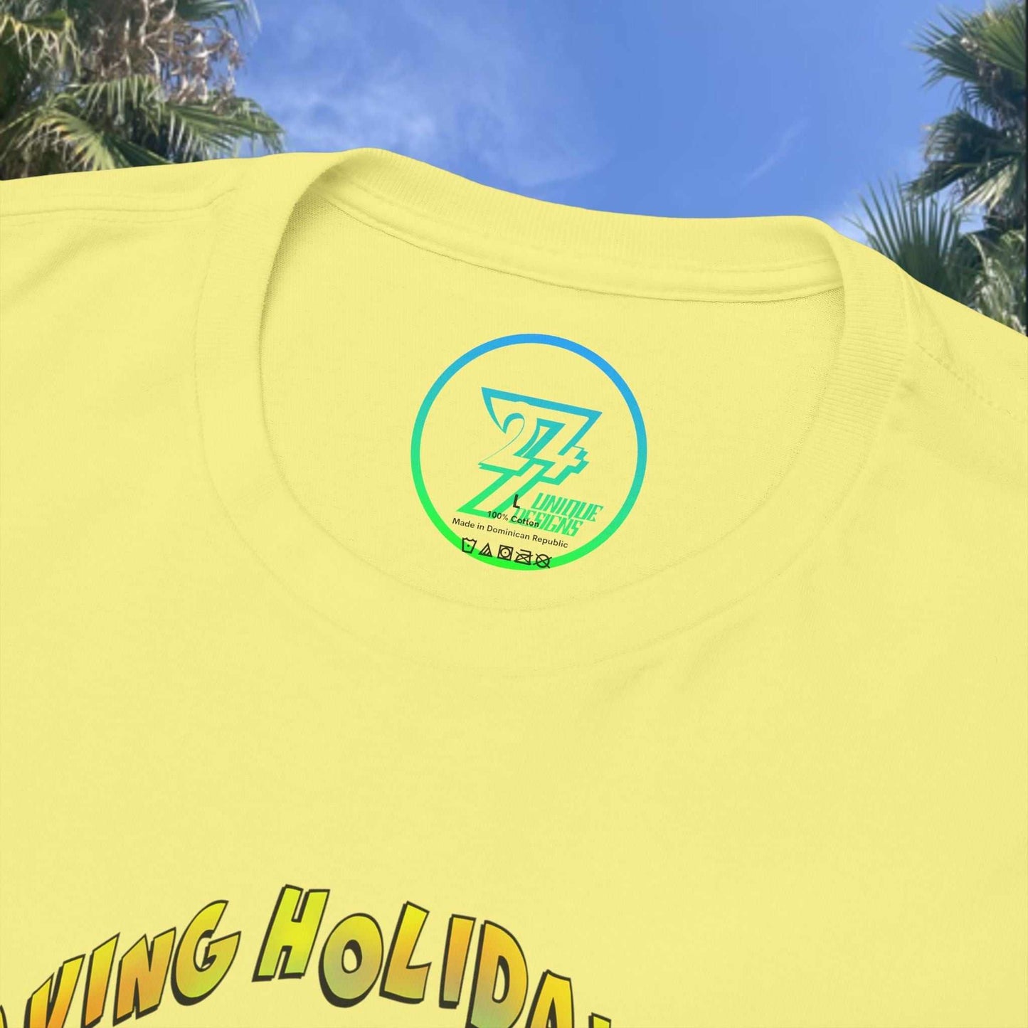Close-up of a light yellow t-shirt collar showing a neat crew neckline and premium cotton fabric.