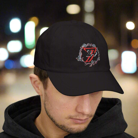 Male model showcasing the black trendy embroidered cap as part of a casual streetwear outfit.