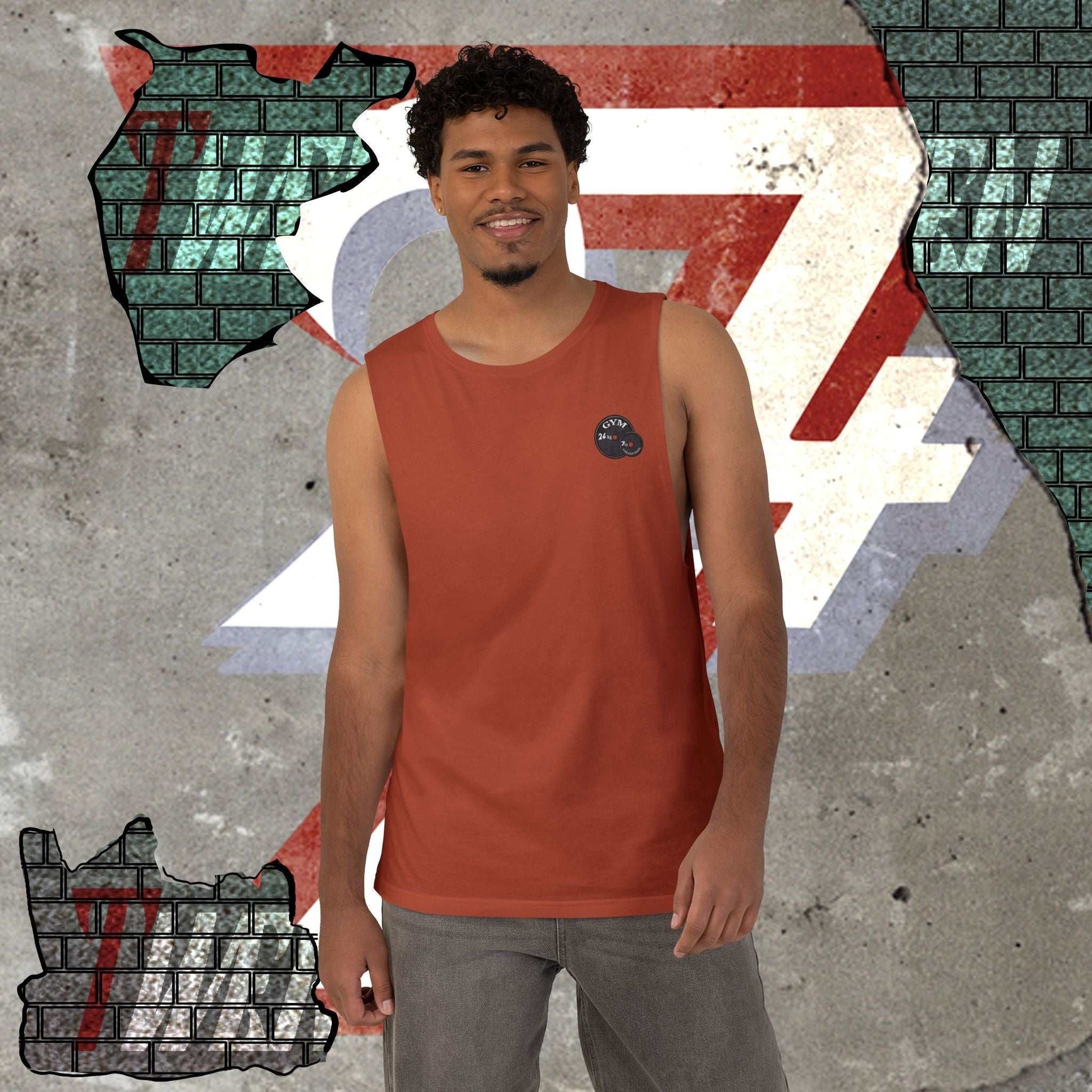 Man wearing the autumn red tank top with the 24/7 logo in front of a colorful abstract background