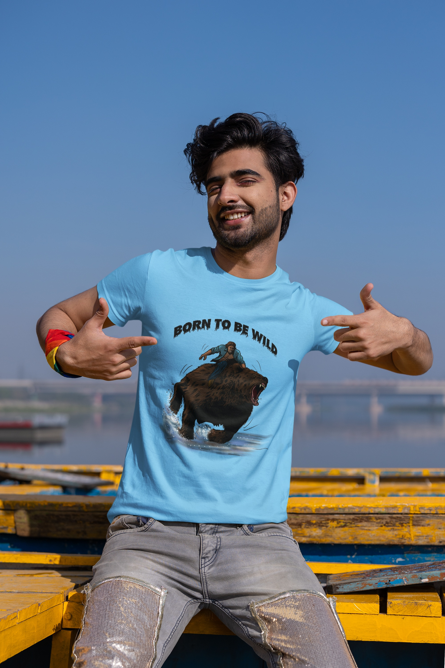 Model showcasing the sky blue vintage comic style bear t-shirt