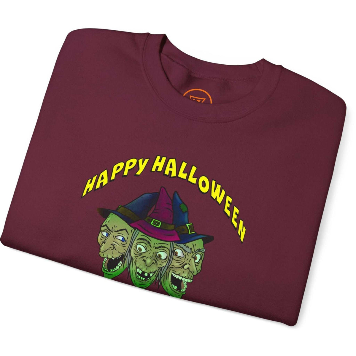 Neatly folded maroon trick or treat sweatshirt highlighting the crisp digital front print and cozy fabric, laid flat.