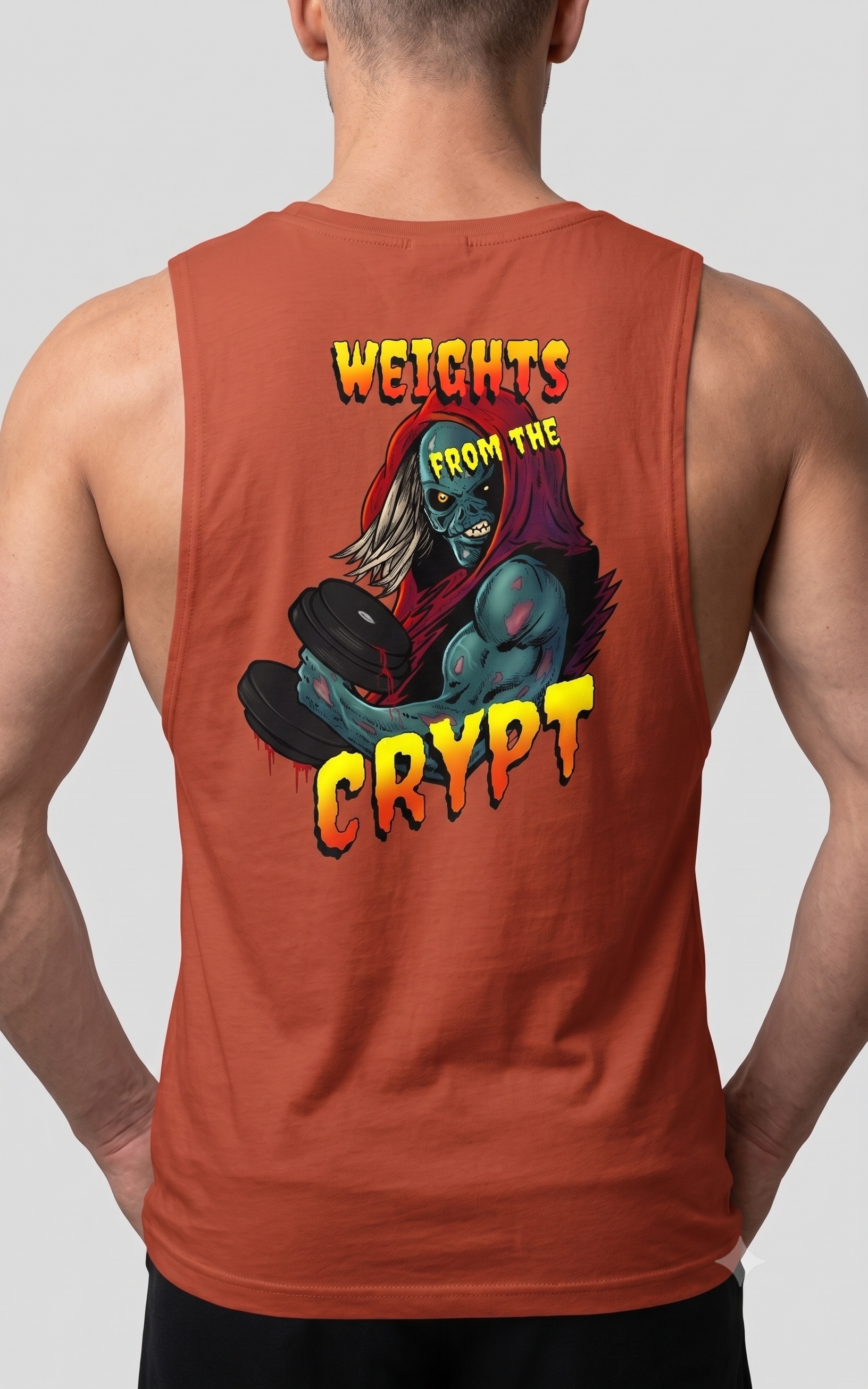 Muscular male model seen from the back wearing the autumn burnt orange bodybuilding muscle tank, highlighting the bold retro horror graphic and raw armholes.