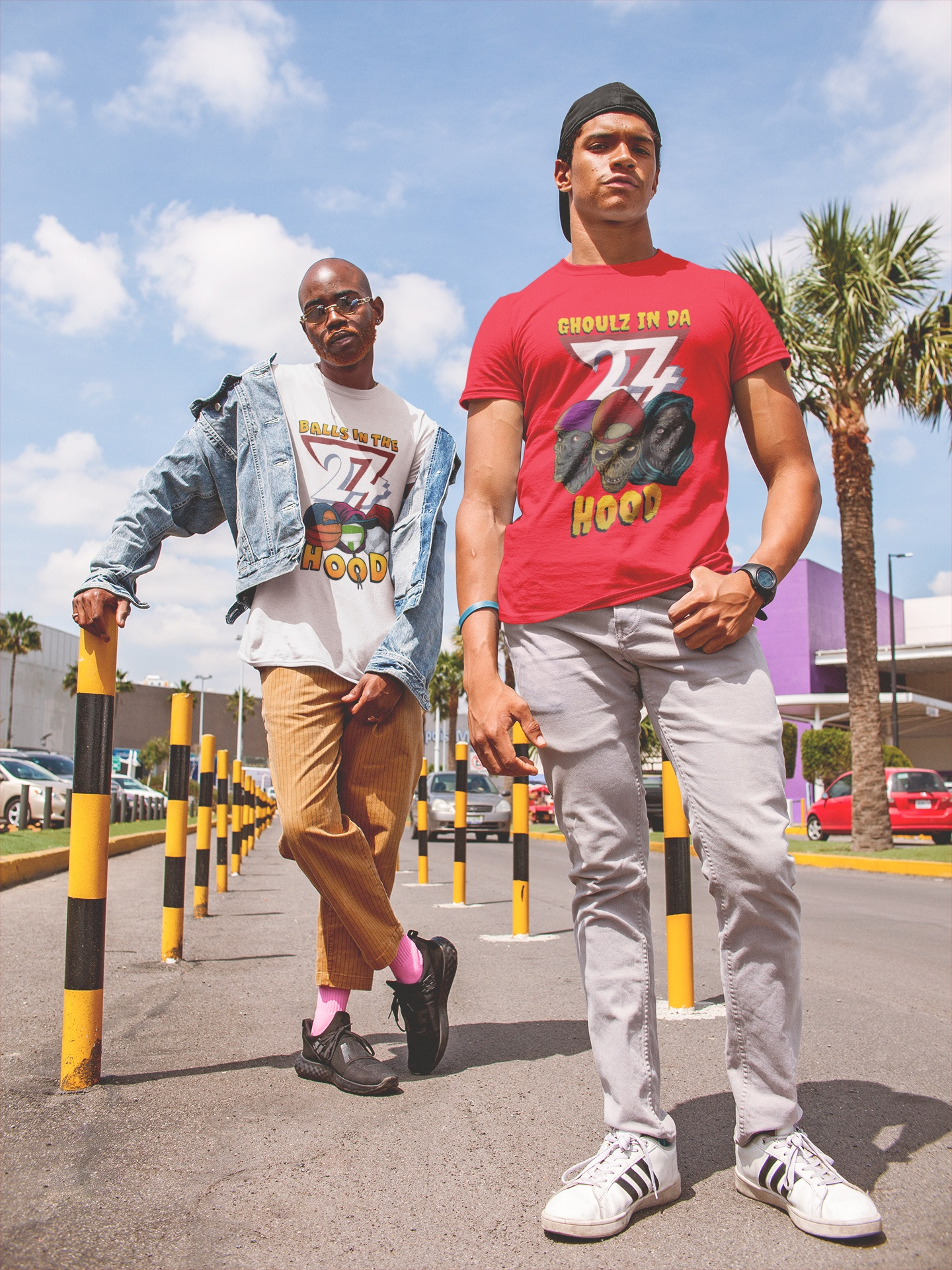 Model wearing the red 24/7 Unique Designs retro 90s graphic shirt in a casual streetwear setting.