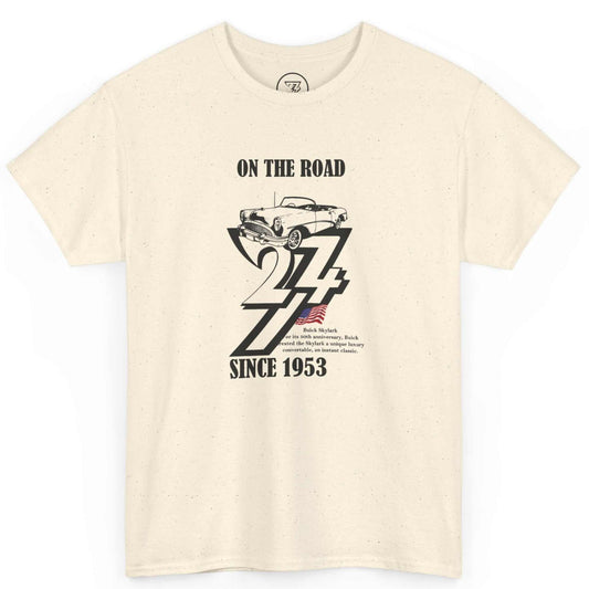 Front view of a natural beige 1953 birthday gift for men tee featuring the black Buick Skylark graphic and American flag accent, displayed on a clean background.