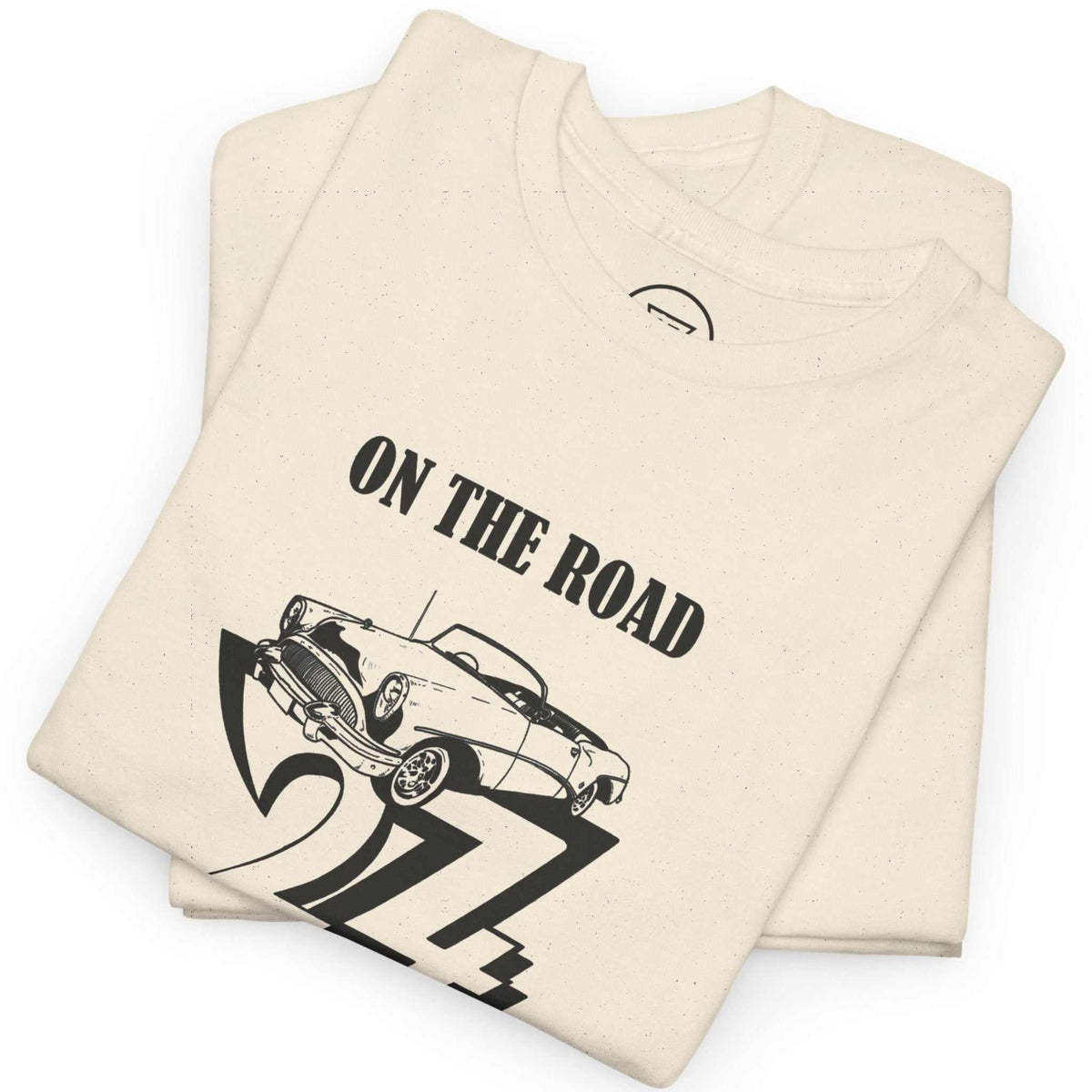 Neatly folded natural beige retro classic car tee highlighting the crisp black digital front print and durable fabric, laid flat.