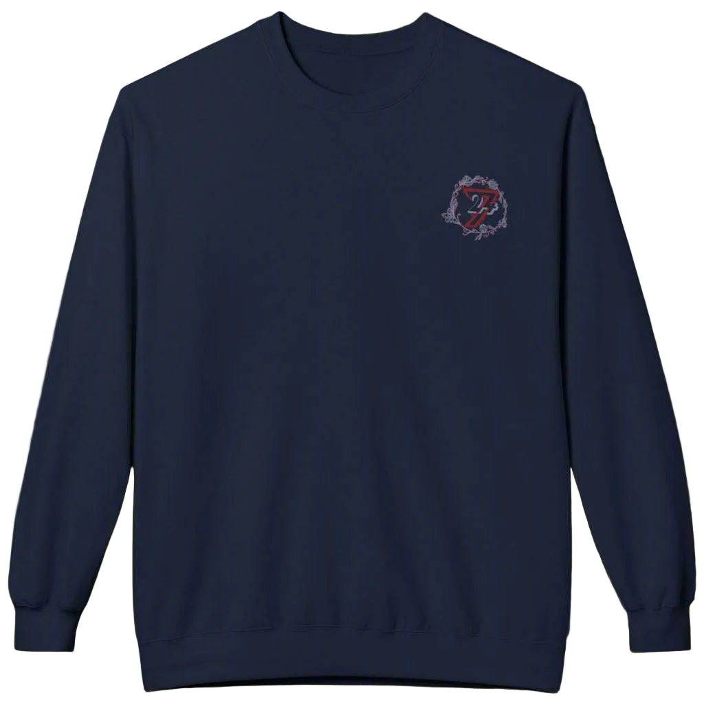 Navy blue floral graphic sweatshirt showing thick ribbed cuffs and a vibrant print.