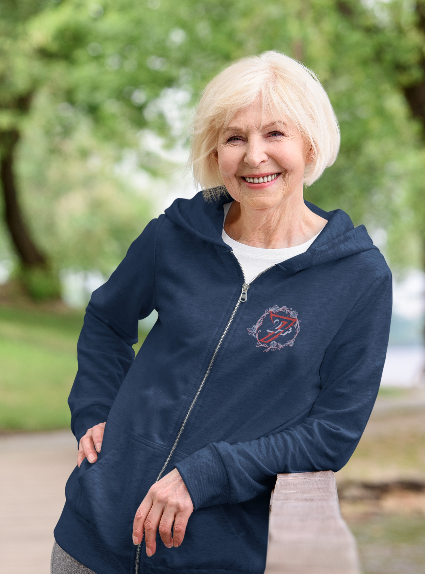 Women's flower zip hoodie in navy on lady model
