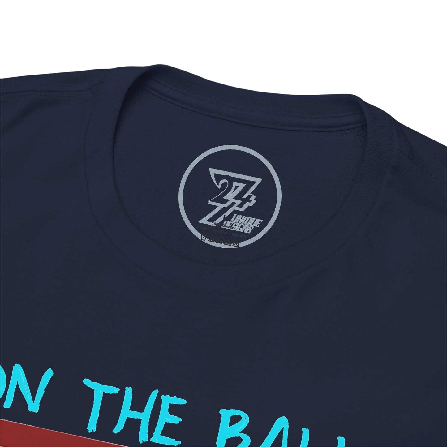 Close-up of the ribbed knit collar on the navy retro cricket clothing tee, clearly showing the official 24/7 Unique Designs trademark logo inner label branding.