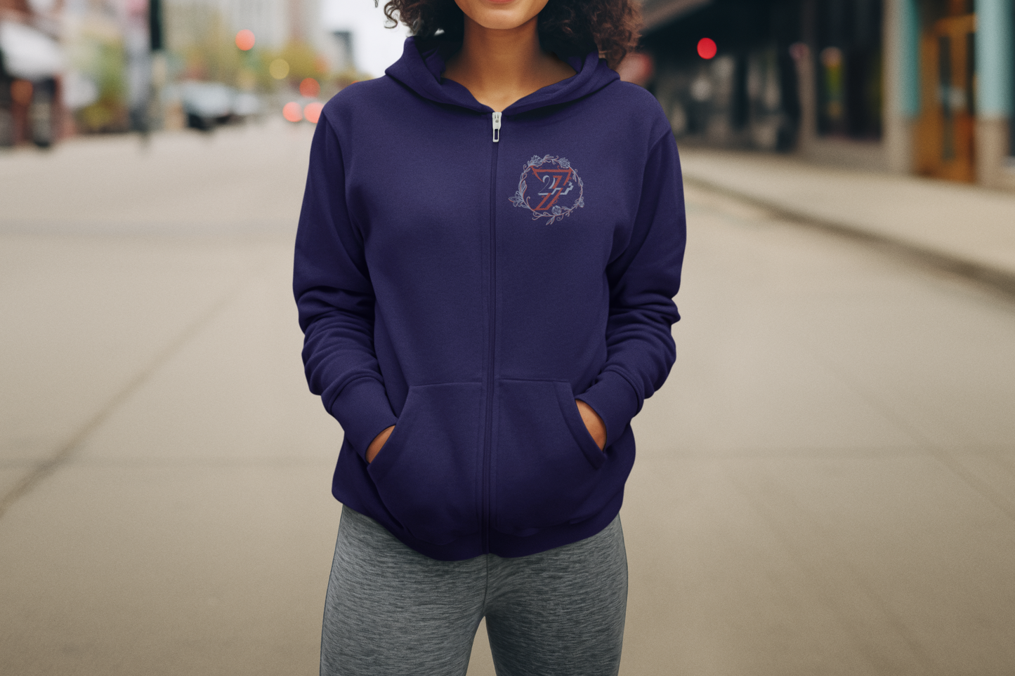 Front view of the Navy Women's Flower Zip Hoodie worn by a female model