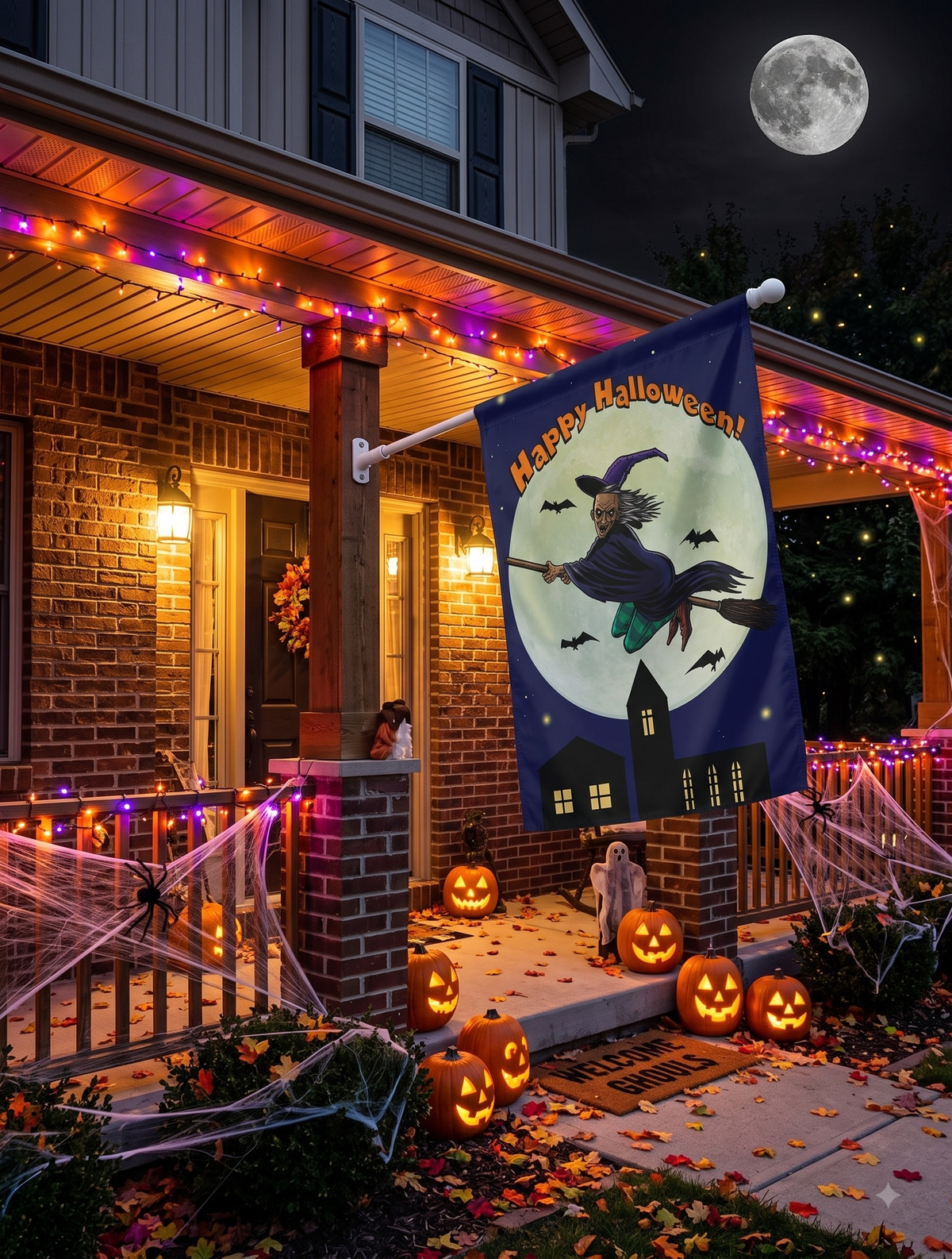 Vibrant night view of a decorated Halloween porch with glowing jack-o'-lanterns, purple lights, and cobwebs, featuring the mounted spooky witch house banner under a real full moon.