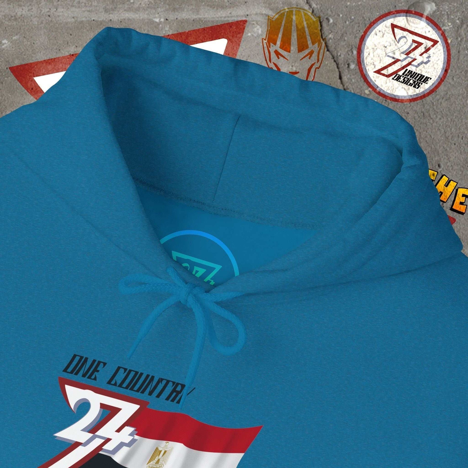 Macro close-up of the inner neck area showing the authentic 24/7 Unique Designs trademark logo on the Egypt hoodie.