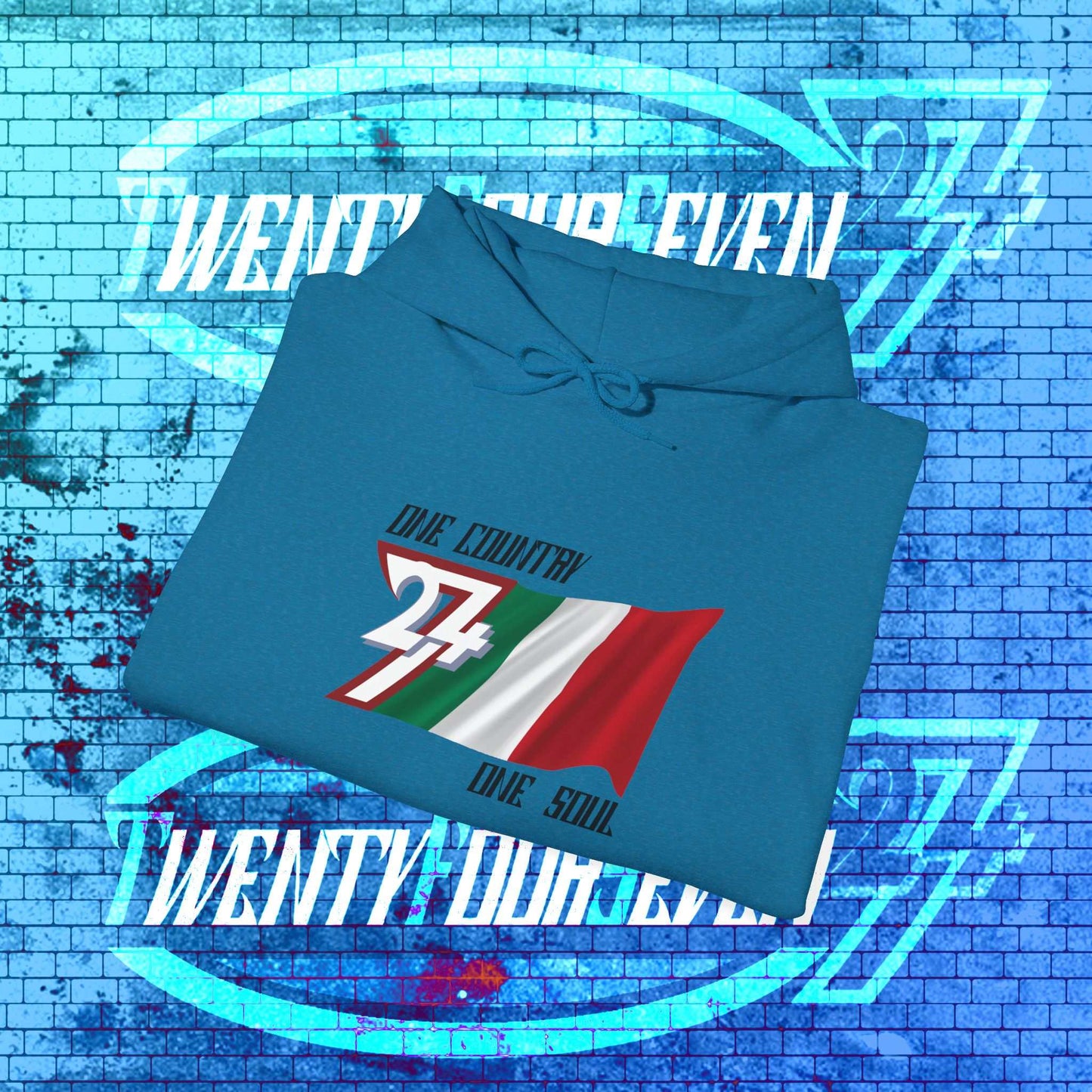 A professional display of the Italia flag hoodie in Ocean Blue, folded to showcase the refined hand-drawn graphic and 8oz fabric weight.