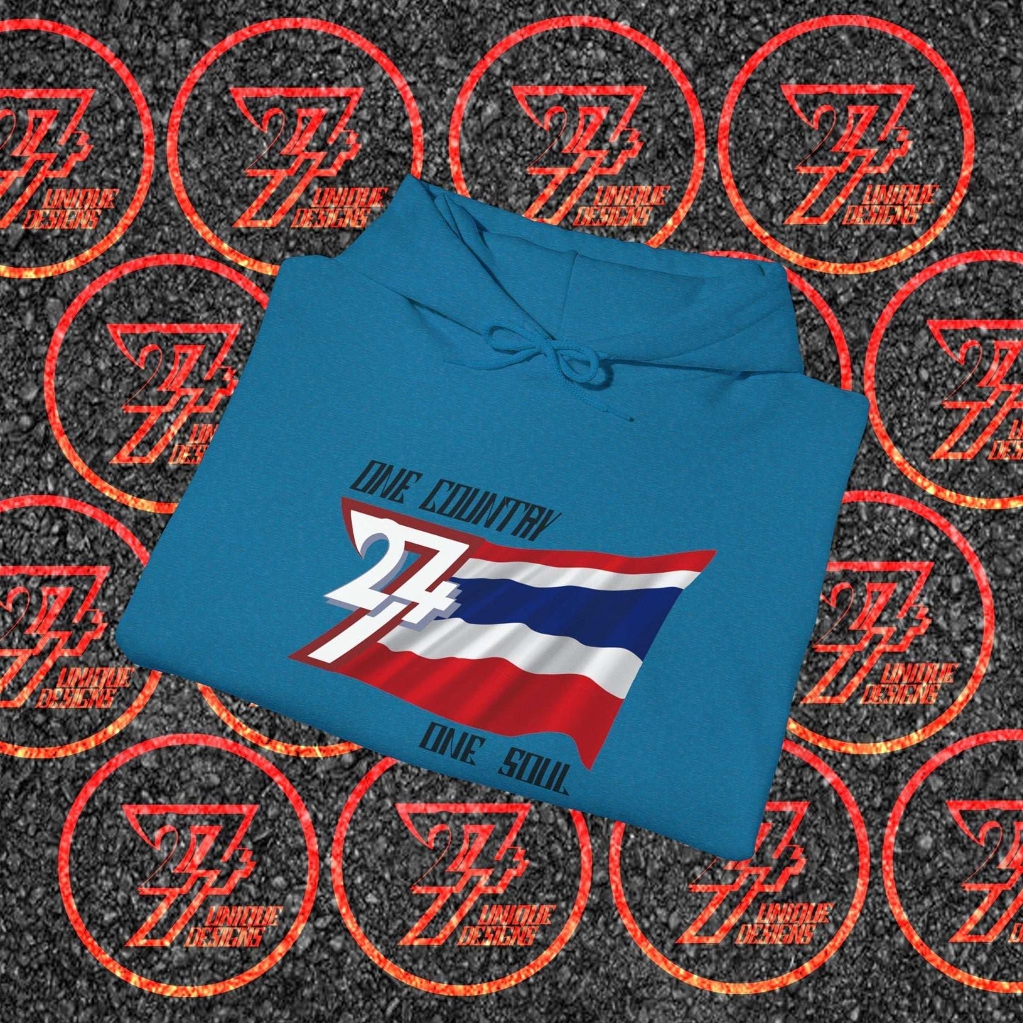 A professional display of the Thailand flag hoodie in Ocean Blue, folded to showcase the refined hand-drawn graphic and 8oz fabric weight.